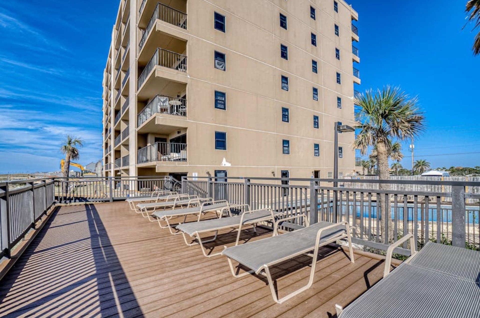 The relaxing pool deck at Ocean Breeze West in Perdido Key, Florida