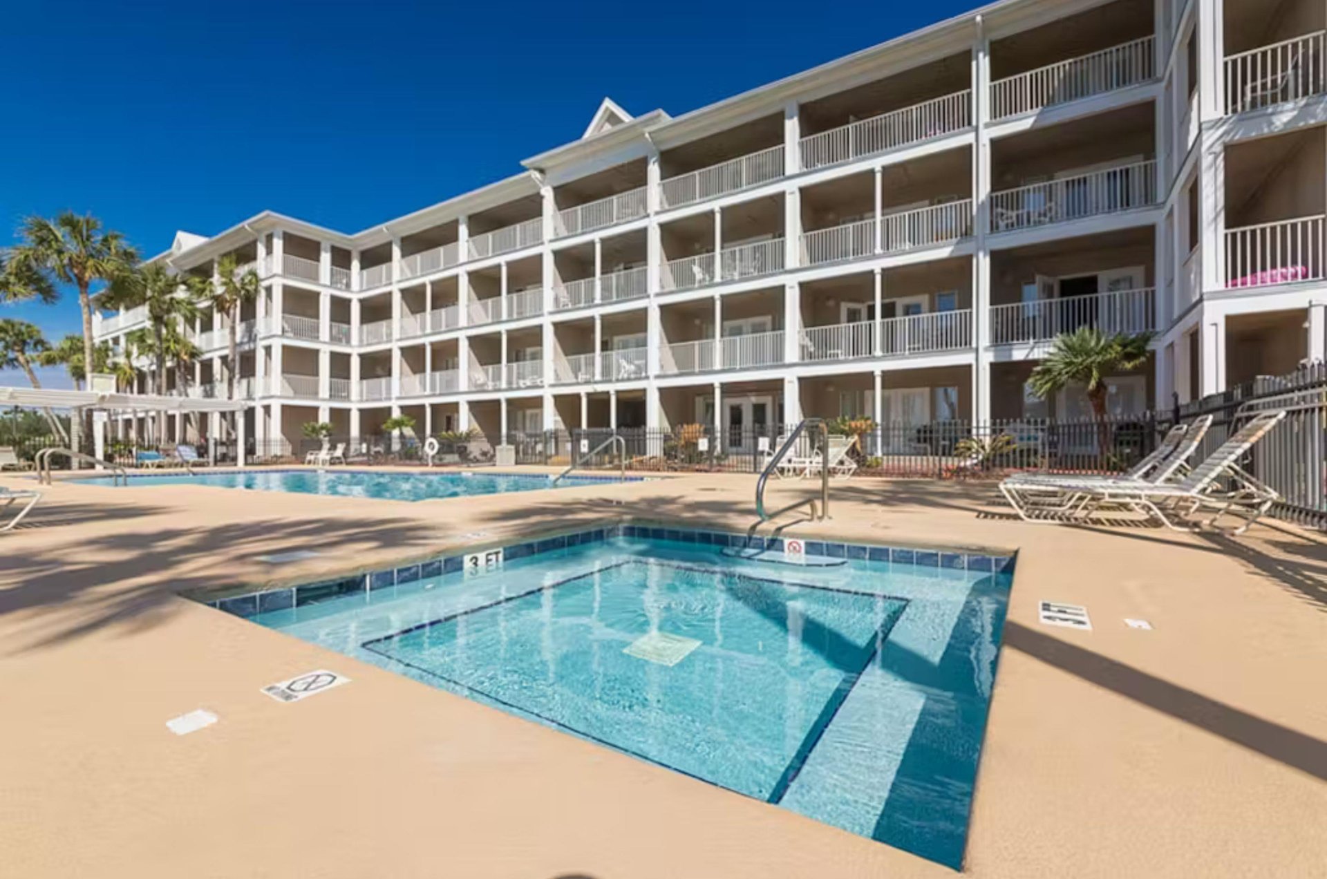 Outdoor hot tub in front of Grand Caribbean