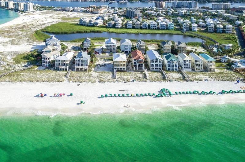 The community is nestled between the Gulf of Mexico and Destin Harbor and includes two lakes.