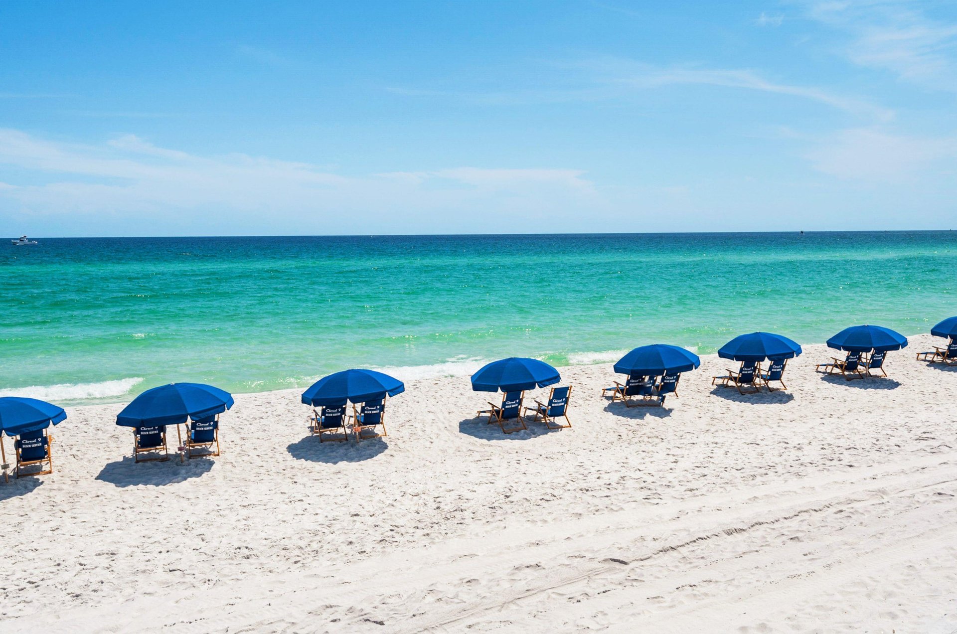 Beach chairs and umbrellas provide a great place to relax in the shade.