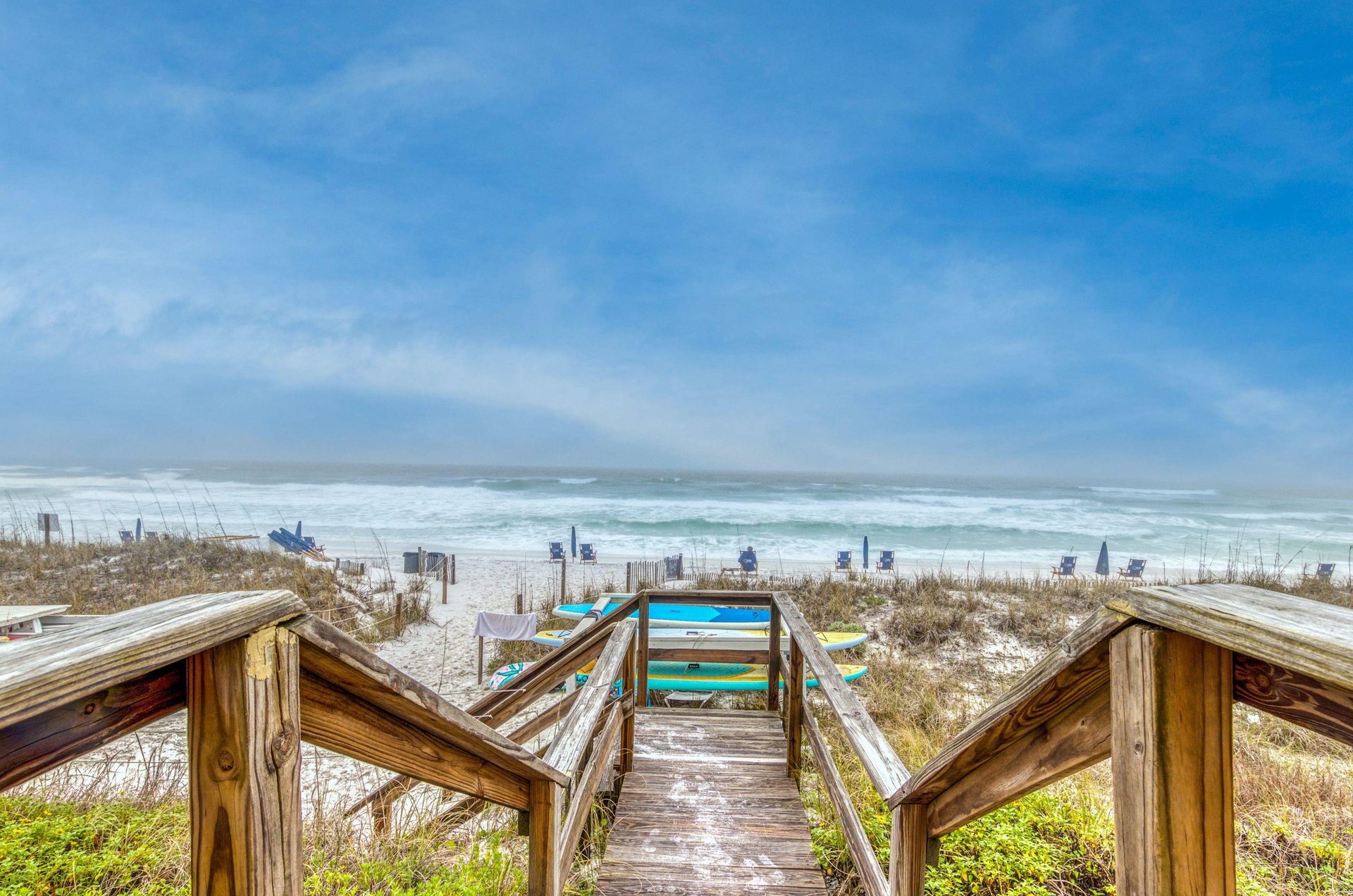 The private boardwalk provides easy access to the beach.
