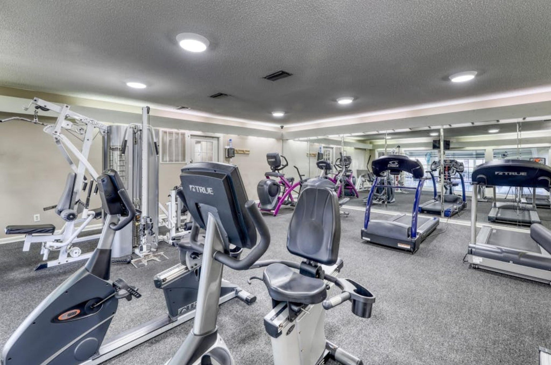 The gym at Summer House on Romar Beach is wellequipped with a variety of machines