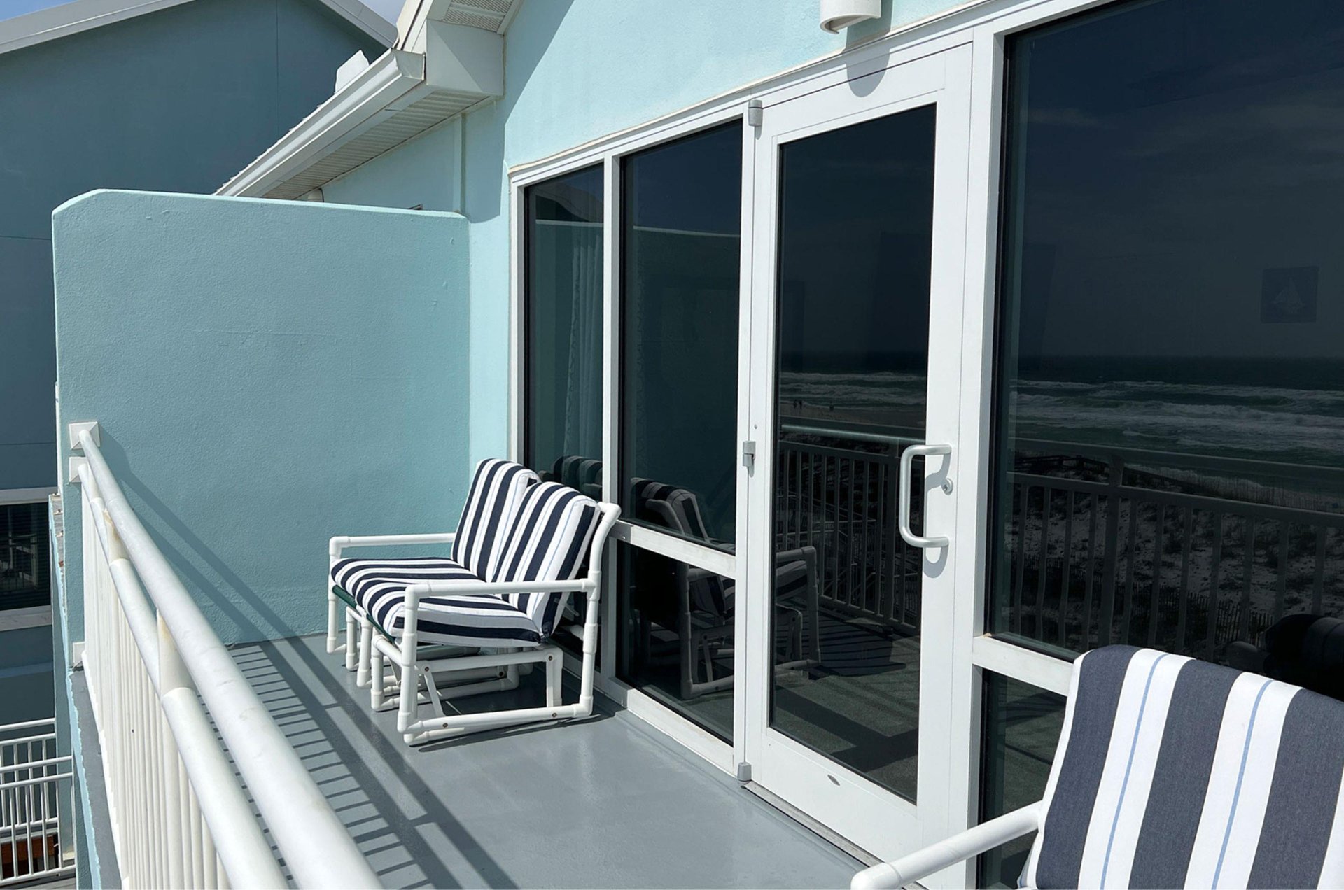 Relax with Gulf views on an upper level balcony