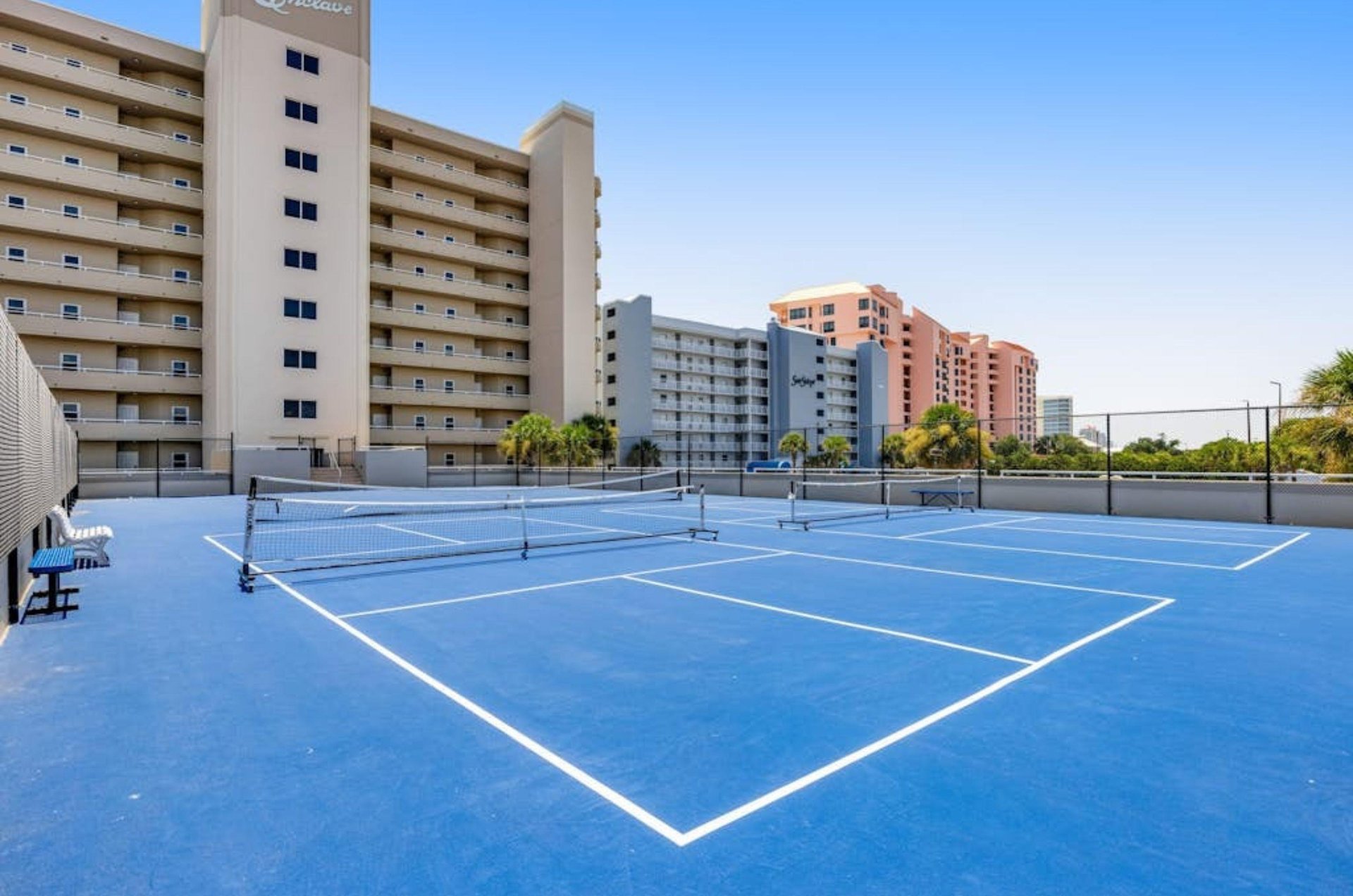 The outdoor tennis courts in front of the Enclave in Orange Beach Alabama
