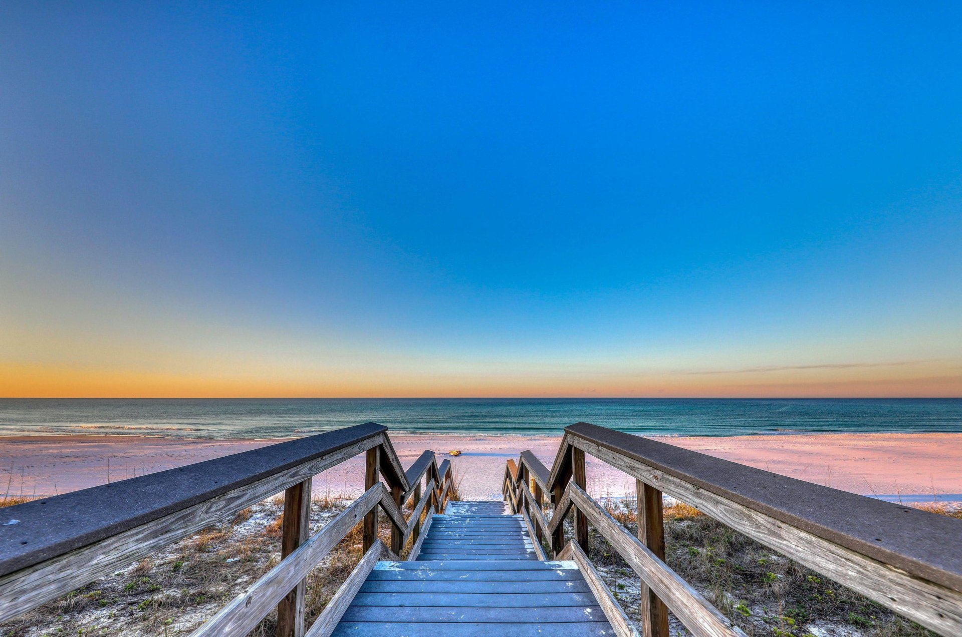 A private boardwalk leads to Beach Resorts private beach.