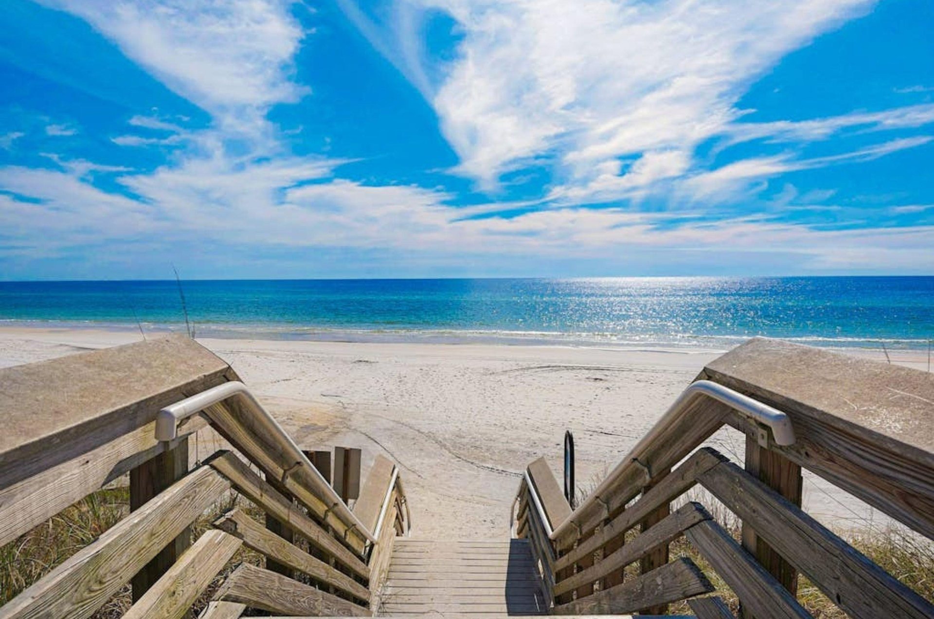 A wooden boardwalk leading to the beach at Cassine Station in Seagrove Beach Florida