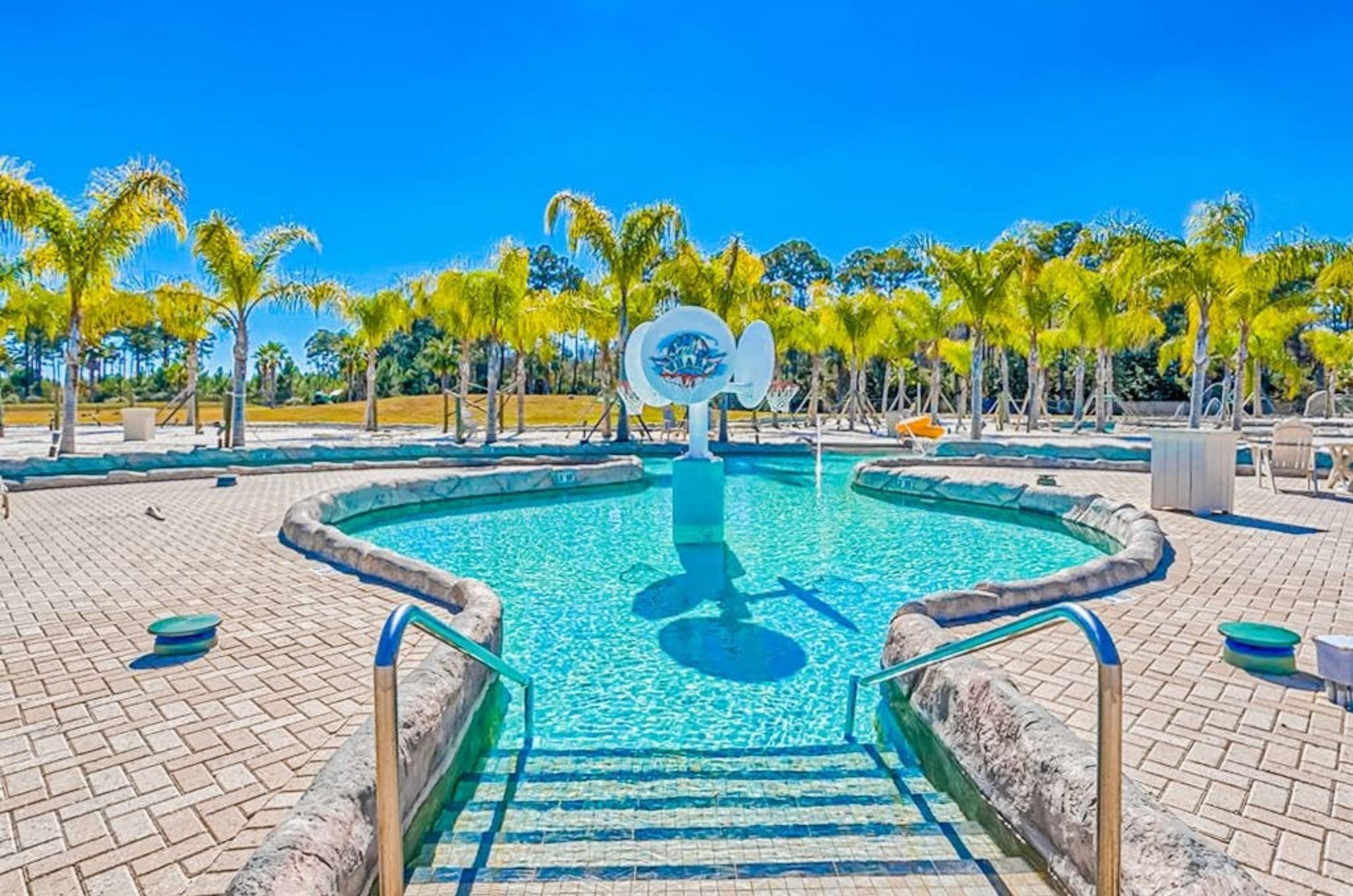 A fountain in the pool at the Wharf Condos in Orange Beach Alabama