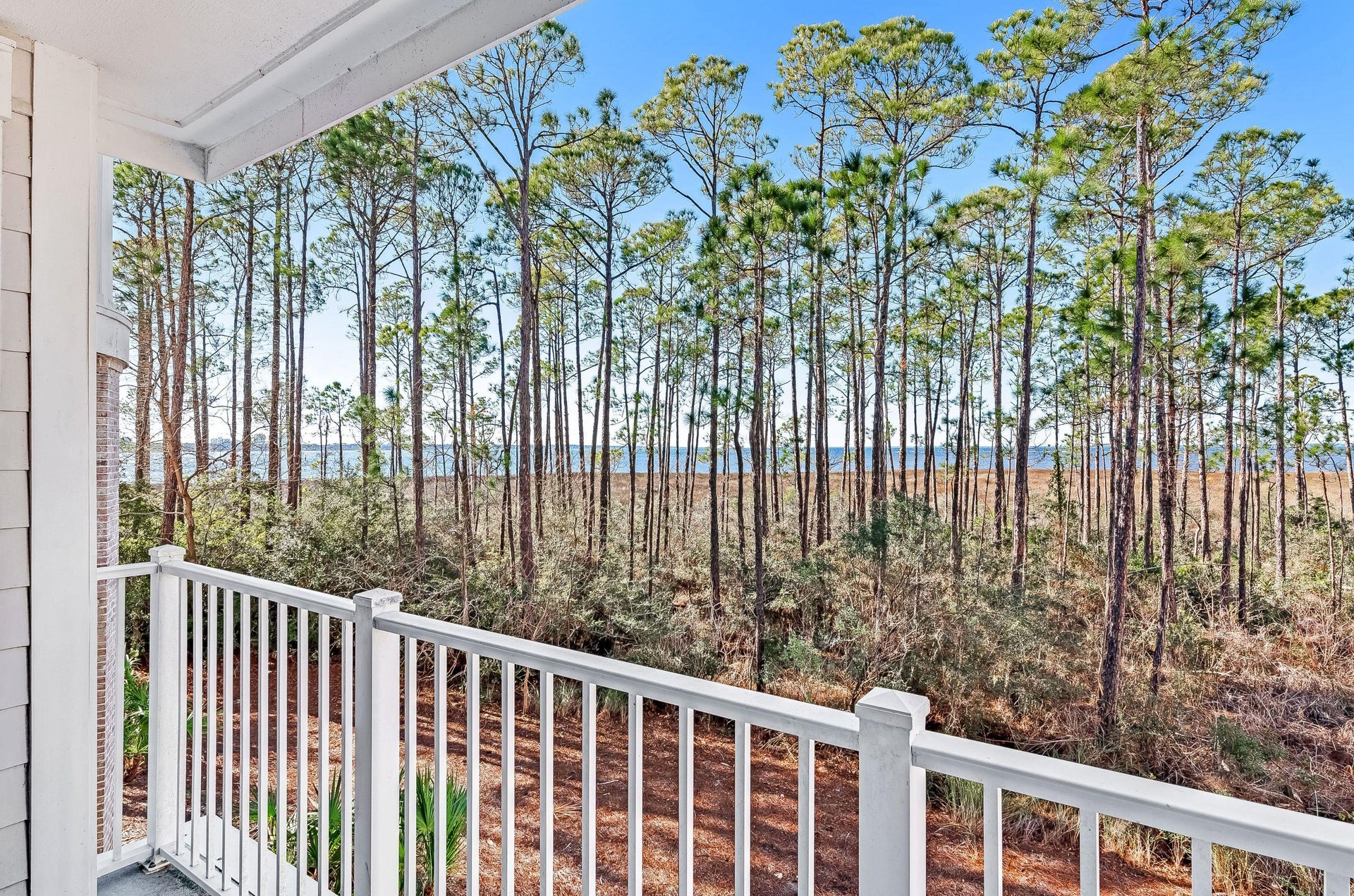 The balcony on this unitand many othersoffers a sweeping view of Choctawhatchee Bay.