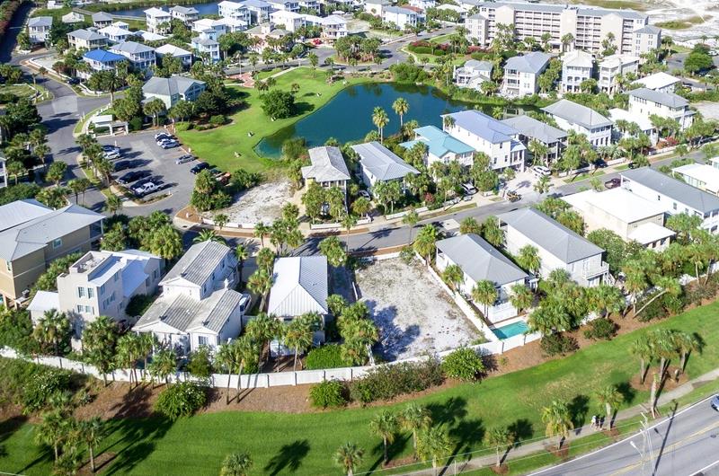 Magnolia House Condos sit near a community lake