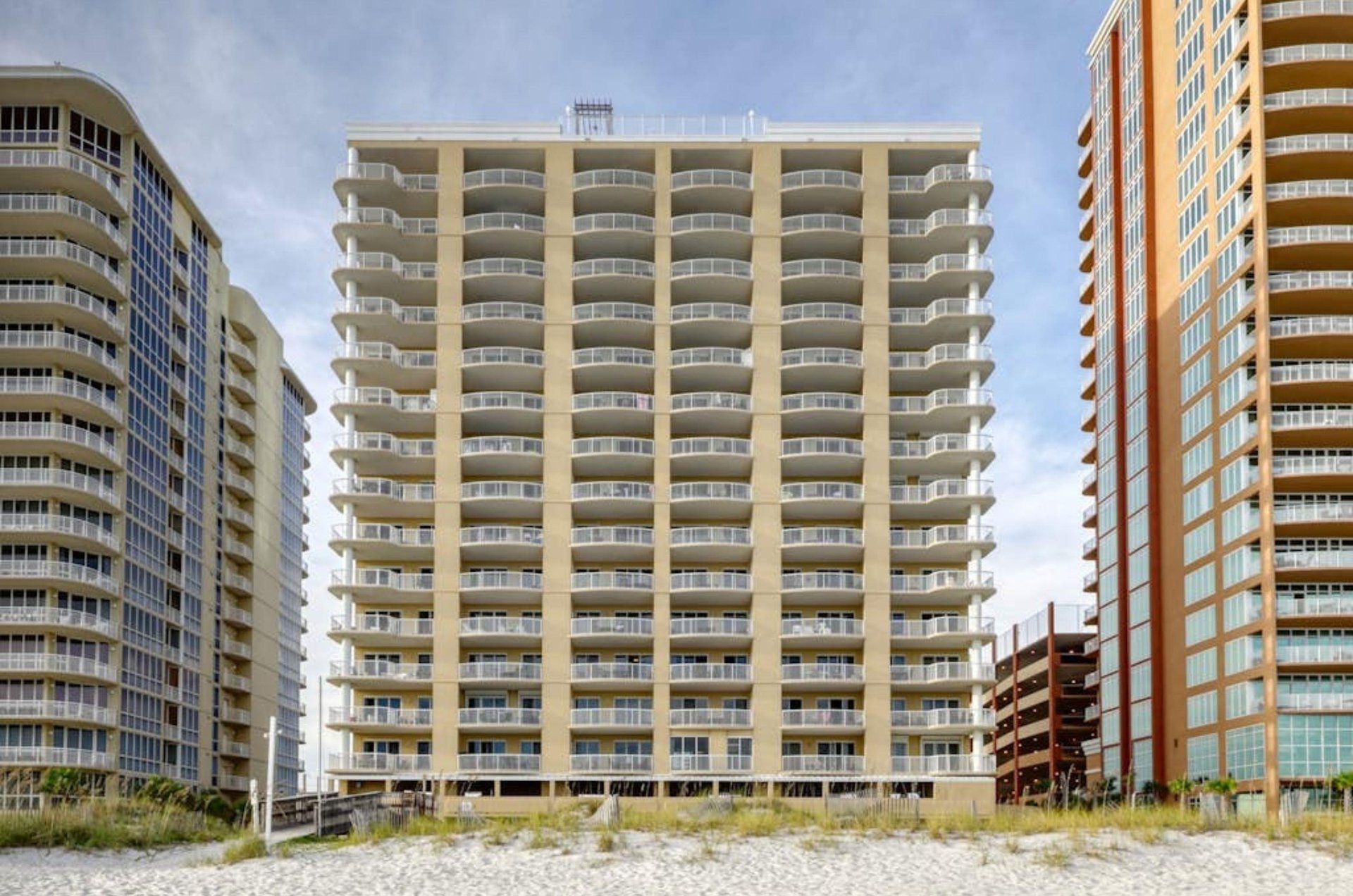 The beachfront exterior of Island Royale in Gulf Shores Alabama