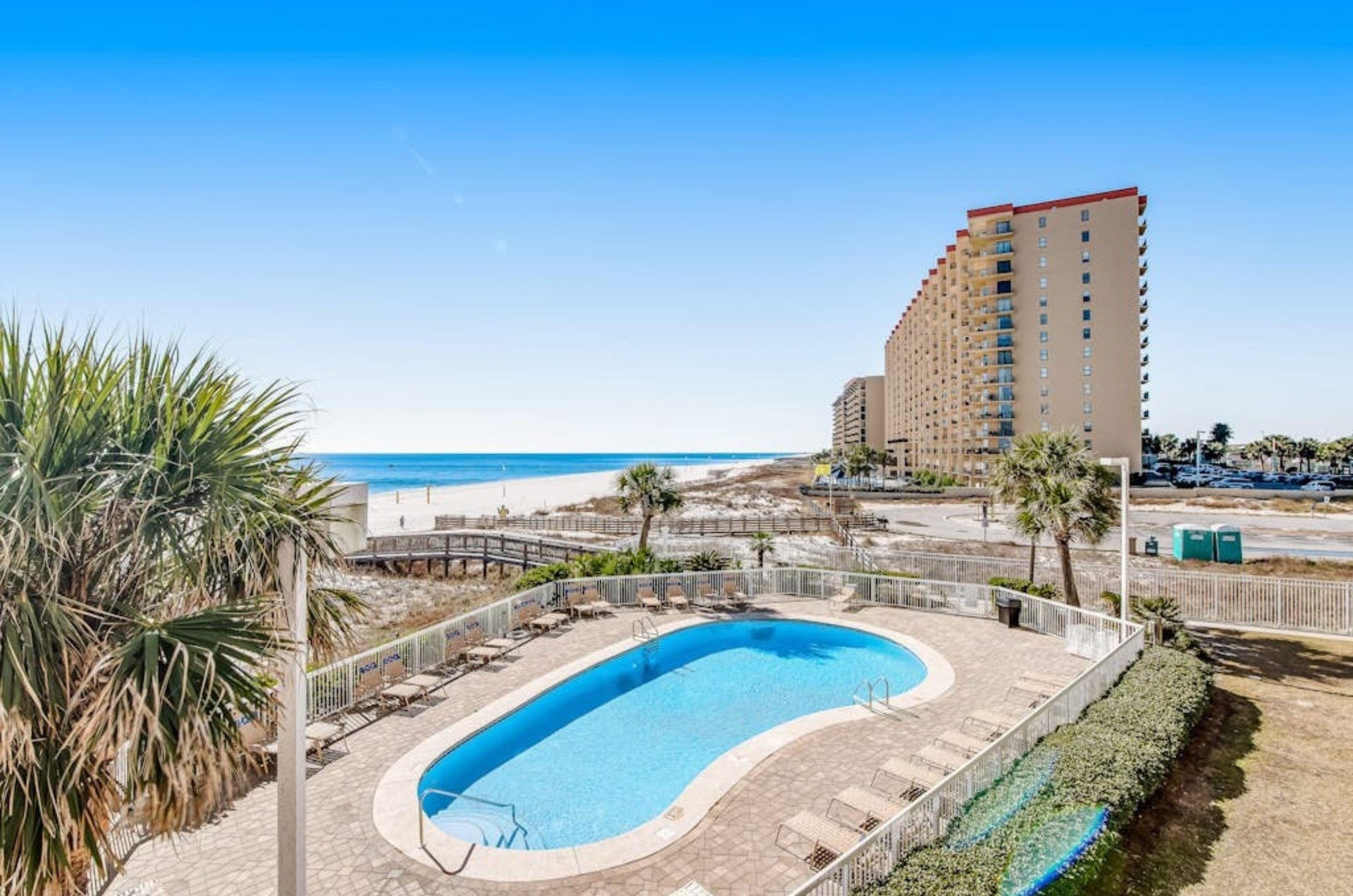 Soak up some sun by the outdoor swimming pools