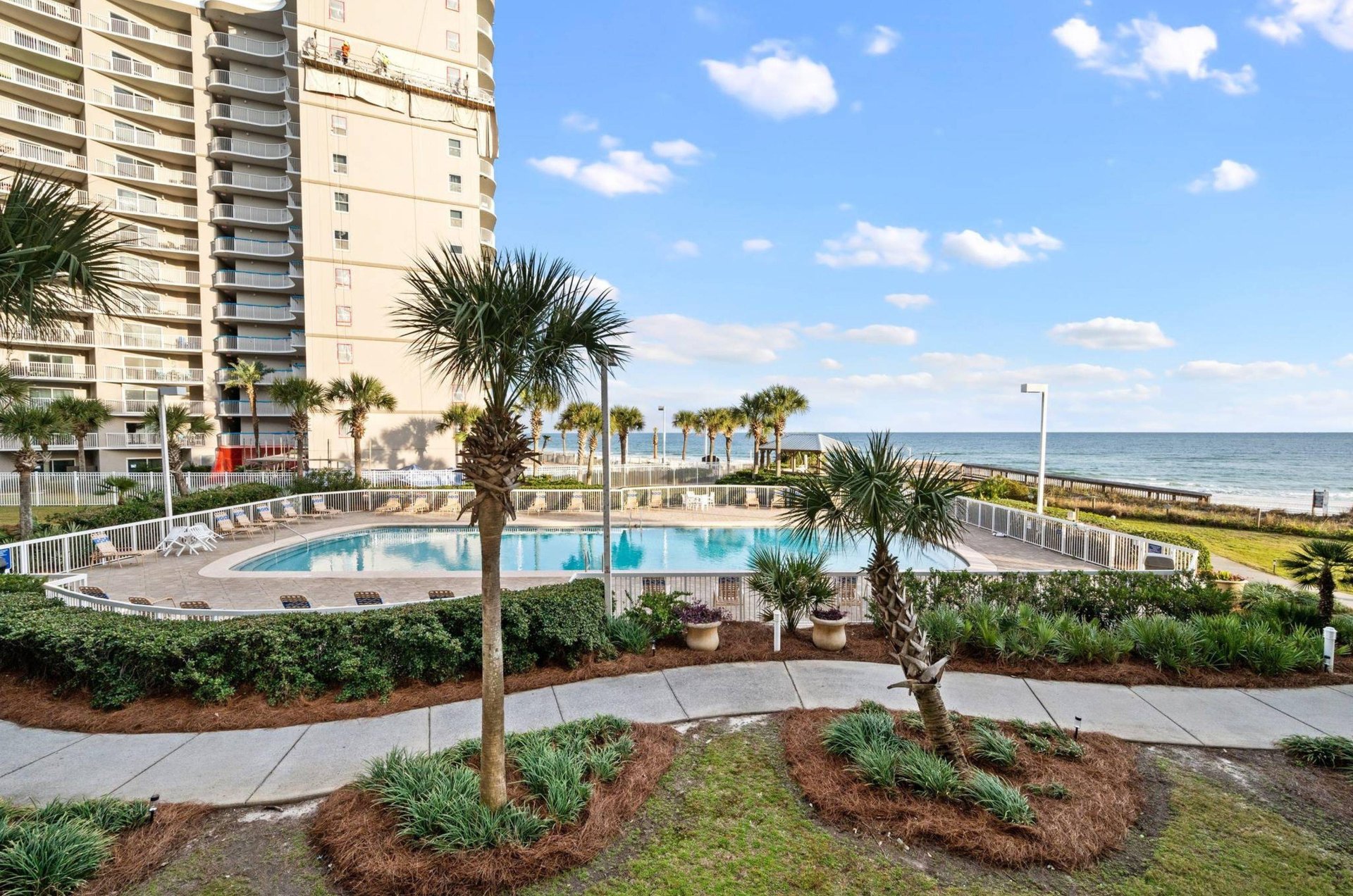 The beachfront outdoor swimming pool at Seaside Beach and Racquet Club in Orange Beach Alabama