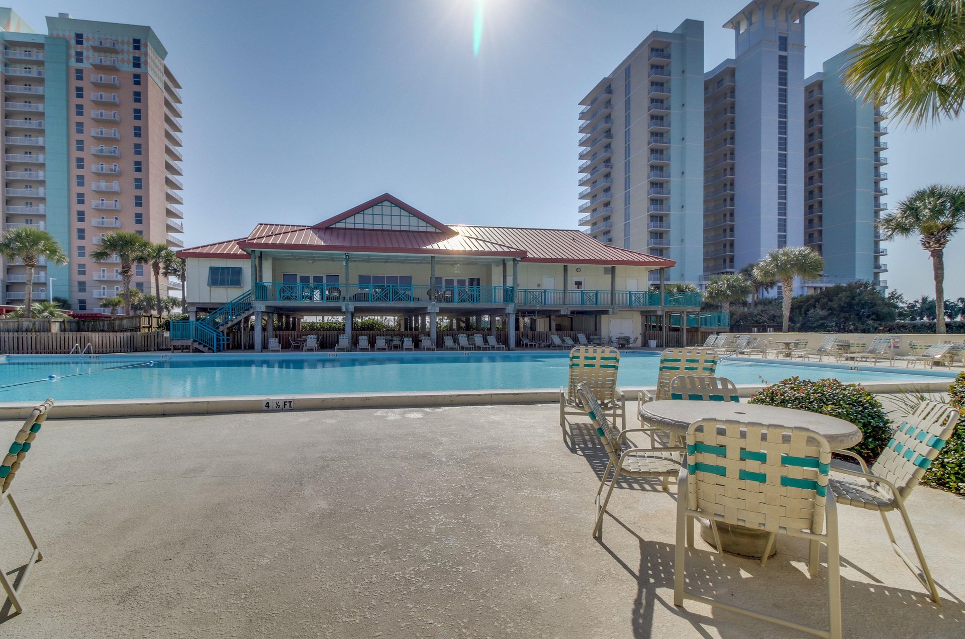 The olympicsized outdoor swimming pool in front of the clubhouse at Santa Rosa Dunes