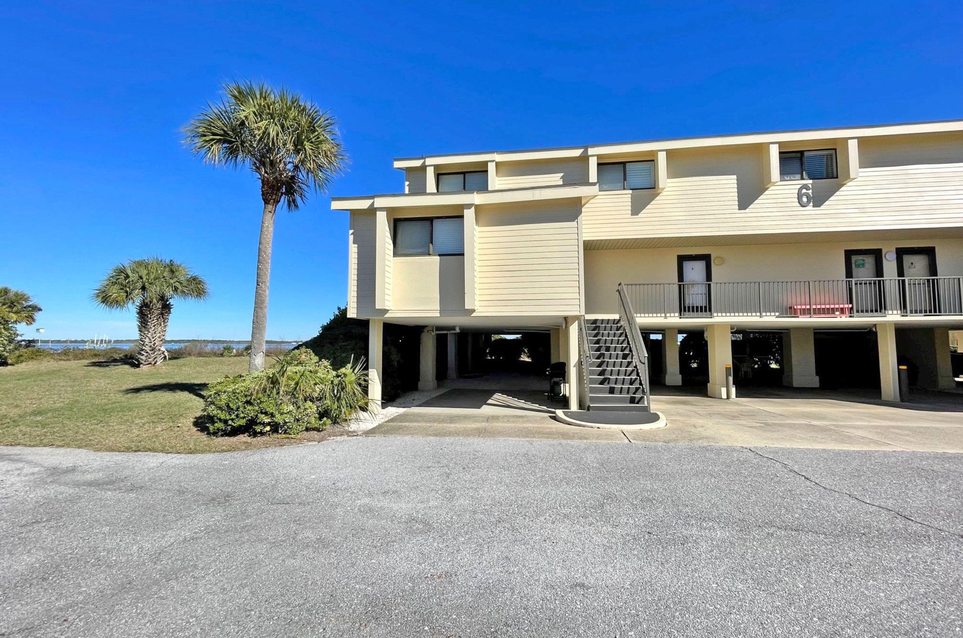 The garage under a townhome with complimentary parking space for guests at Santa Rosa Dunes