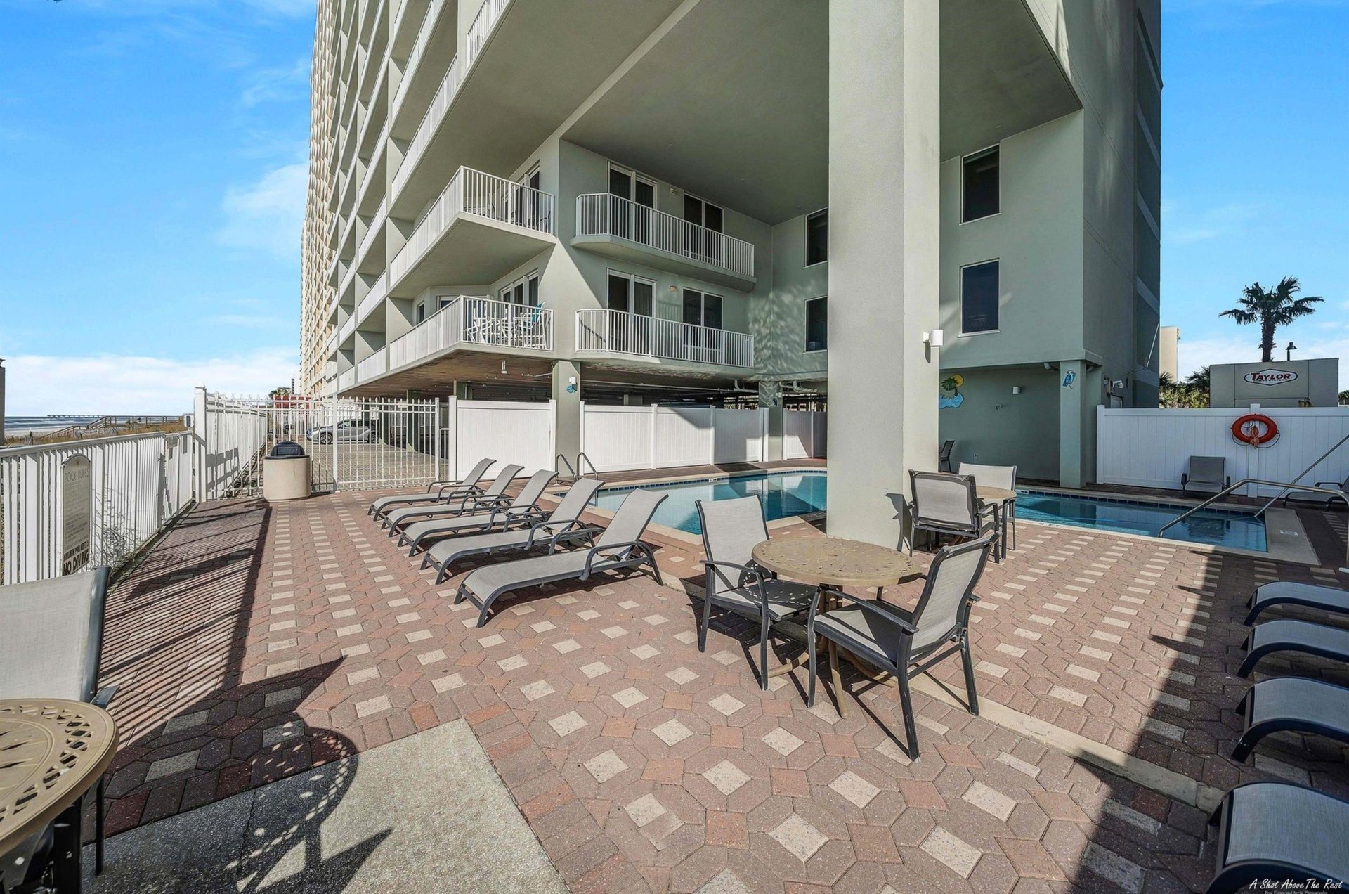 The outdoor swimming pool at Marisol Condominiums