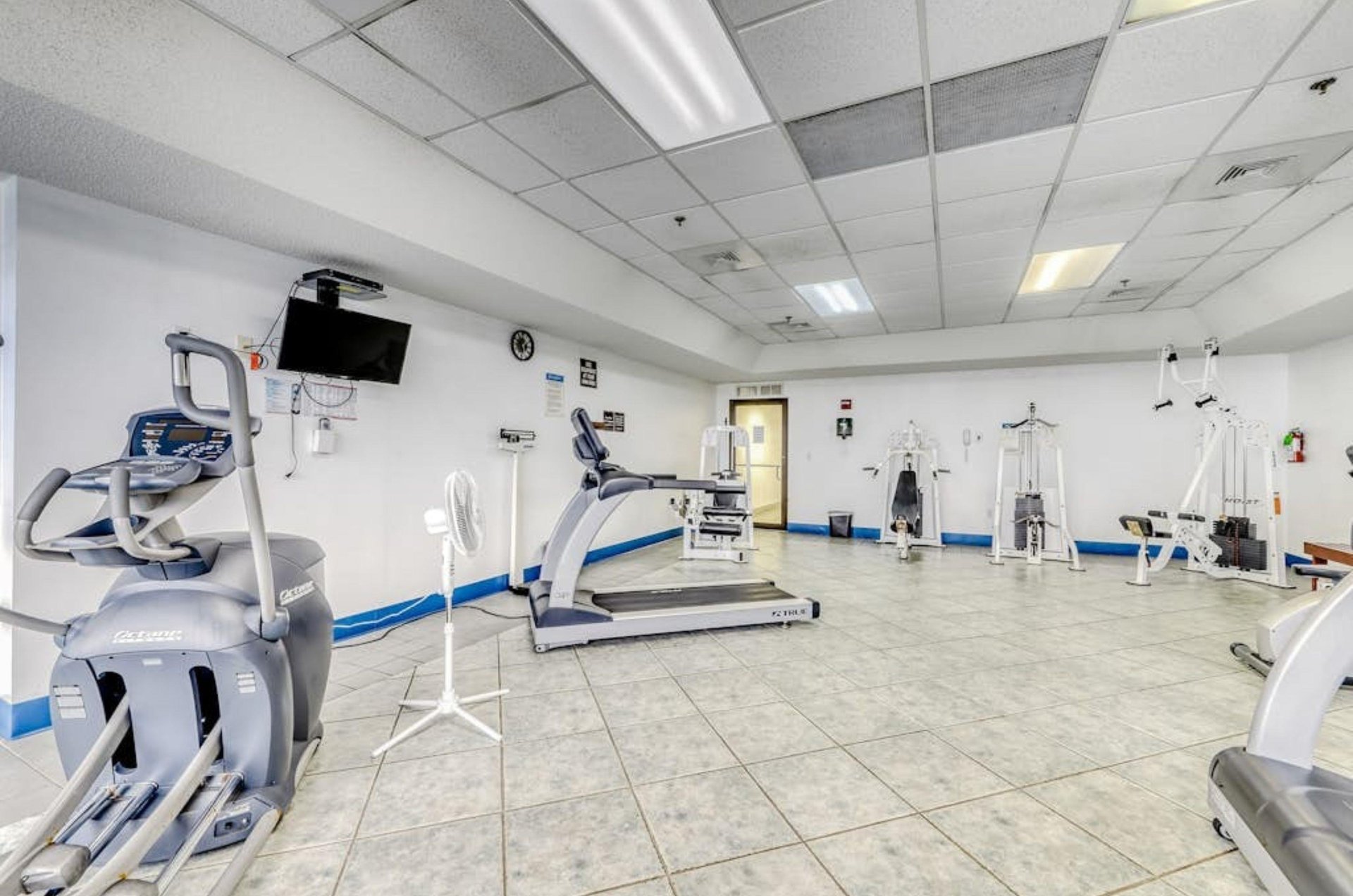 Equipment in the gym at Phoenix VI in Orange Beach Alabama