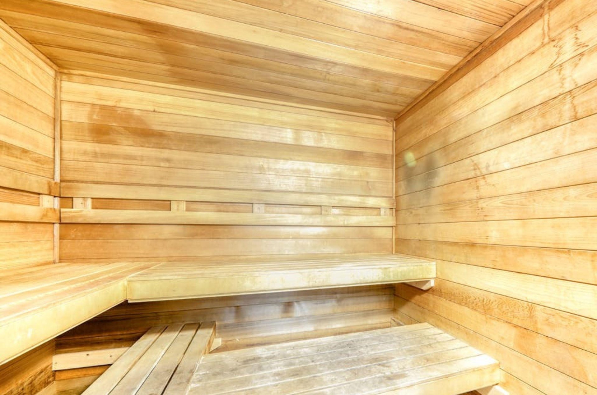 The wooden interior of the sauna at Phoenix VI in Oragne Beach Alabama