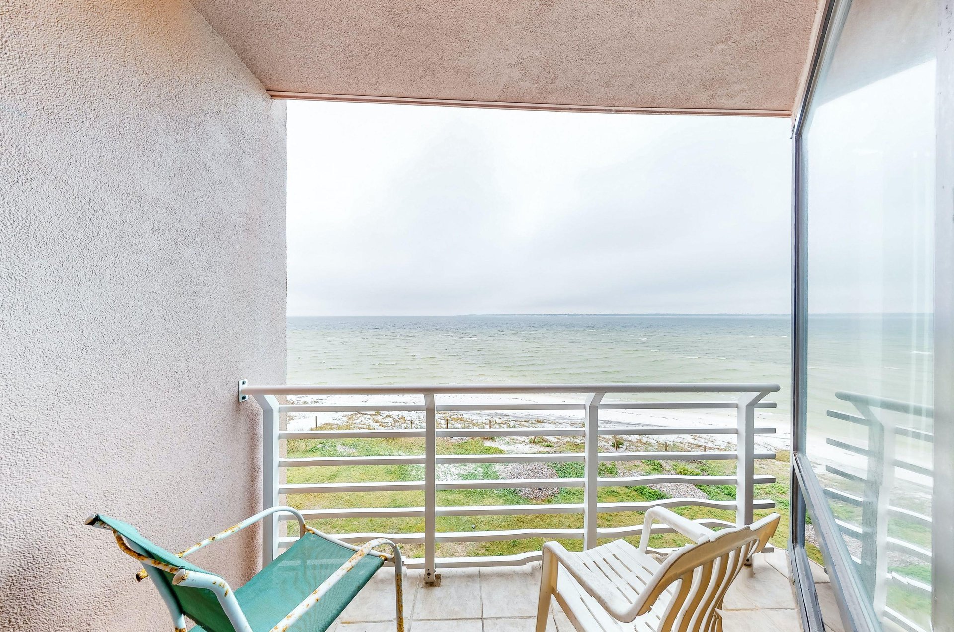 Unwind on a private balcony with Gulf views