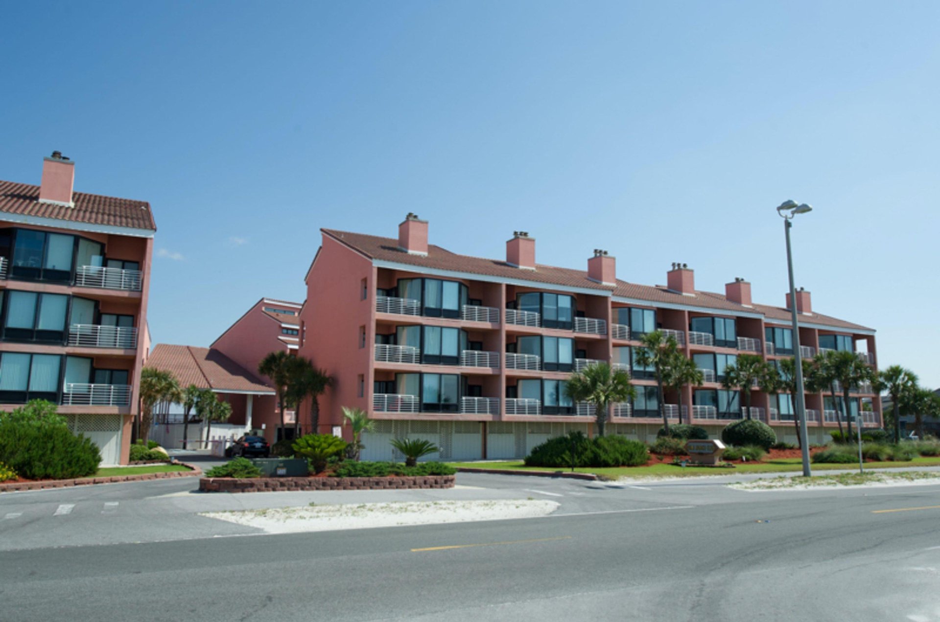 Palm Beach Club is located right next to the entrance of the Gulf Islands National Seashore