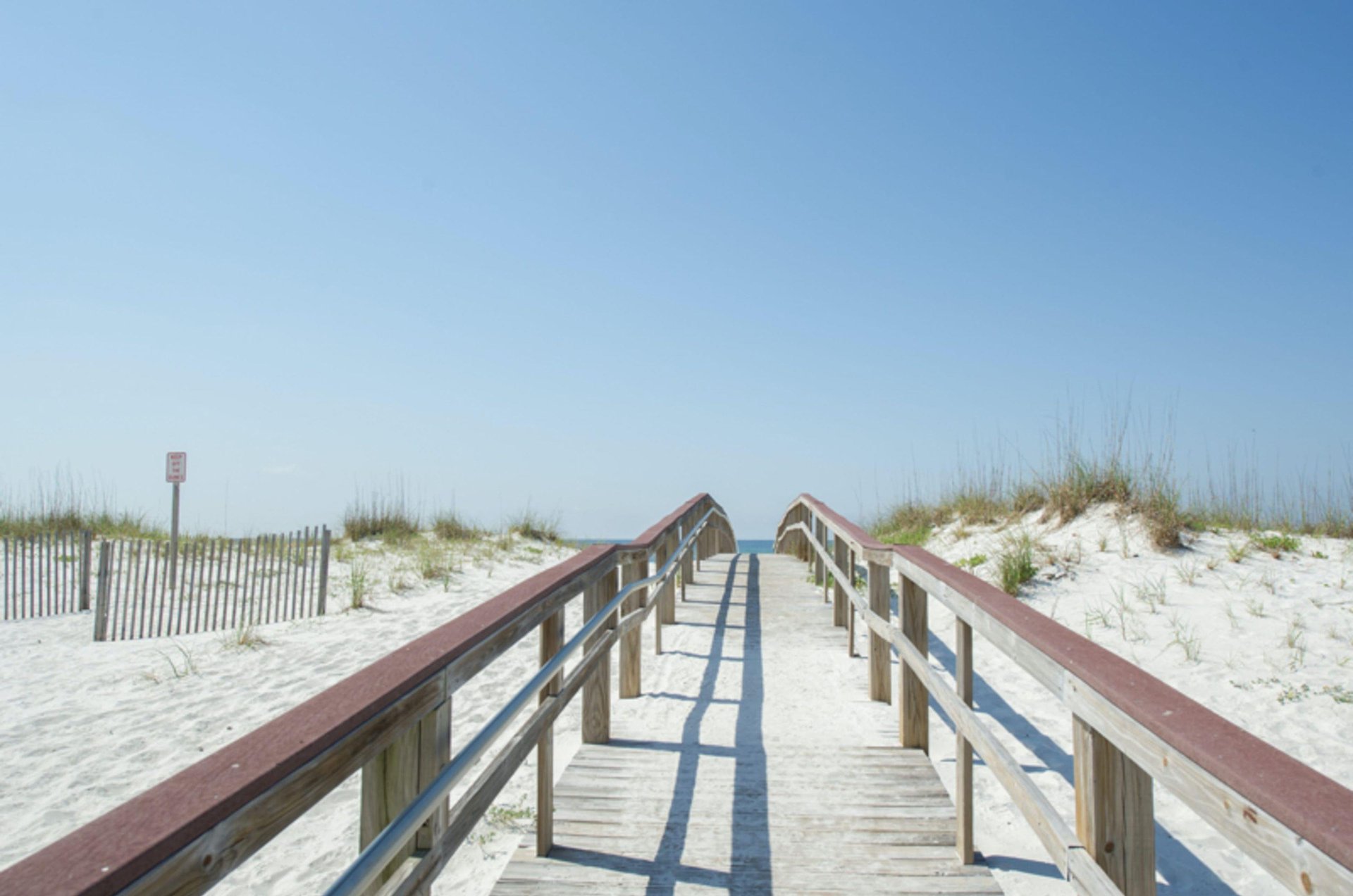 Take in miles of pristine, undeveloped beaches at Palm Beach Club Pensacola Beach