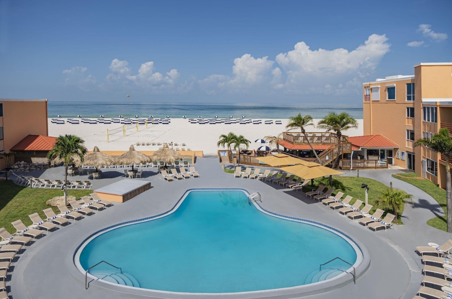 View of the outdoor pool facing the beach at Dolphin Beach Resort