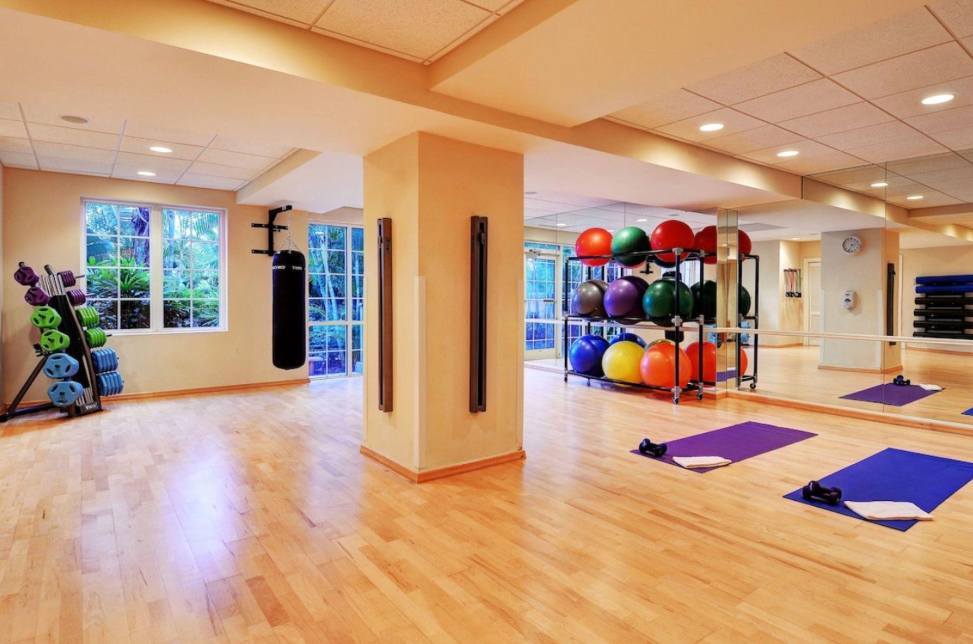 This onsite fitness room is spacious and well equipped.