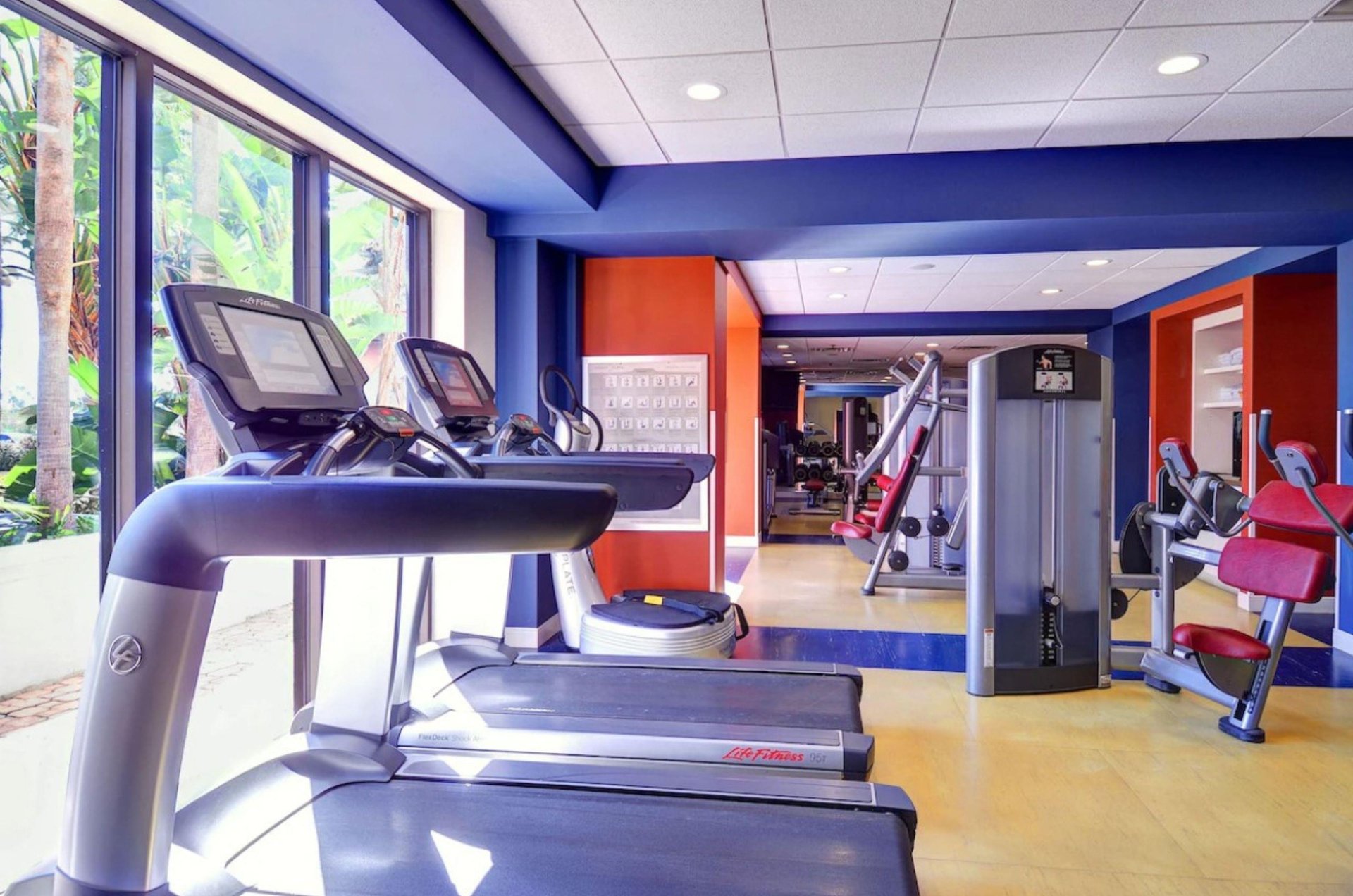 This onsite fitness room has topoftheline equipment.
