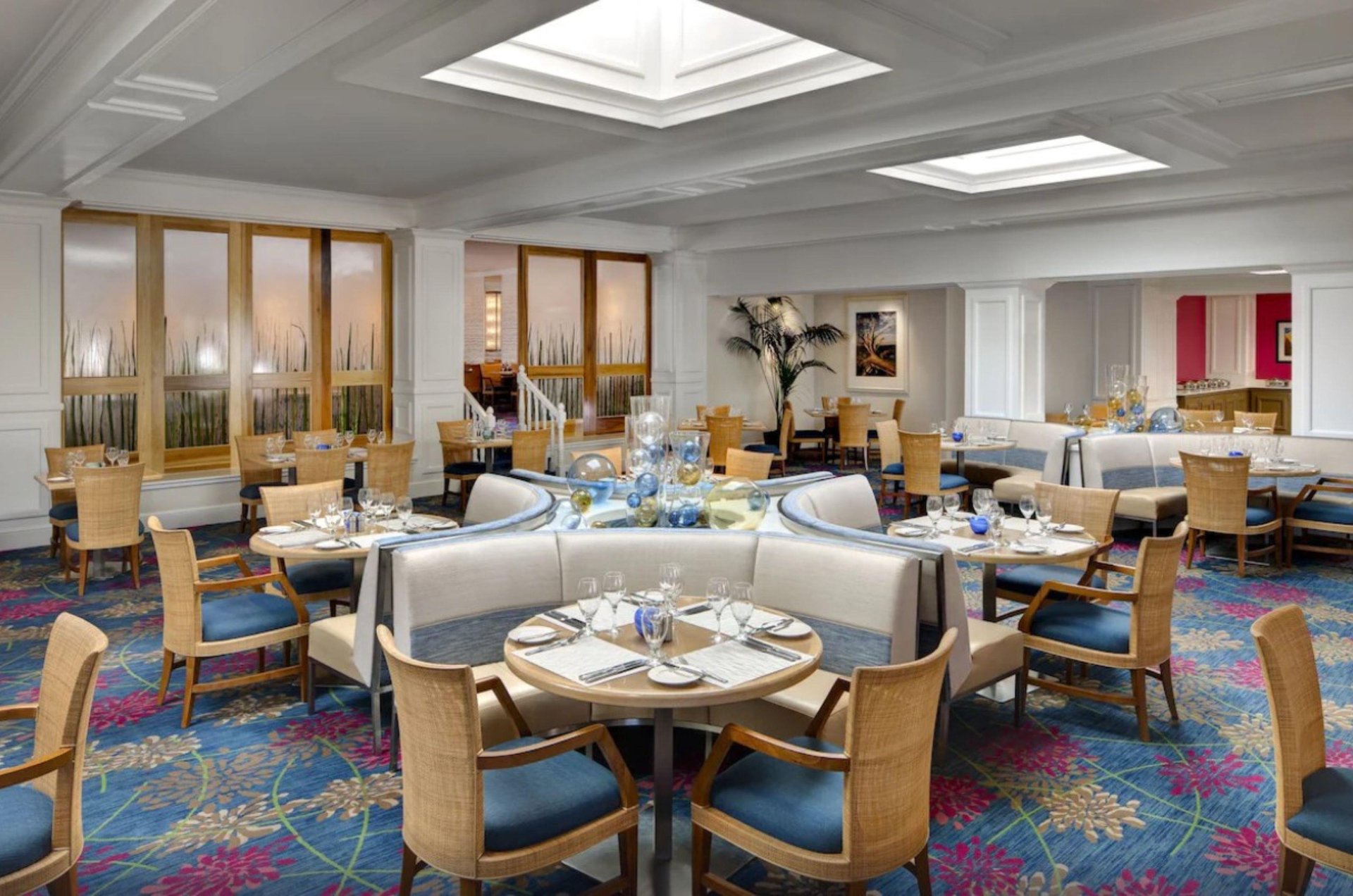 This onsite dining room keeps tables set for guests.