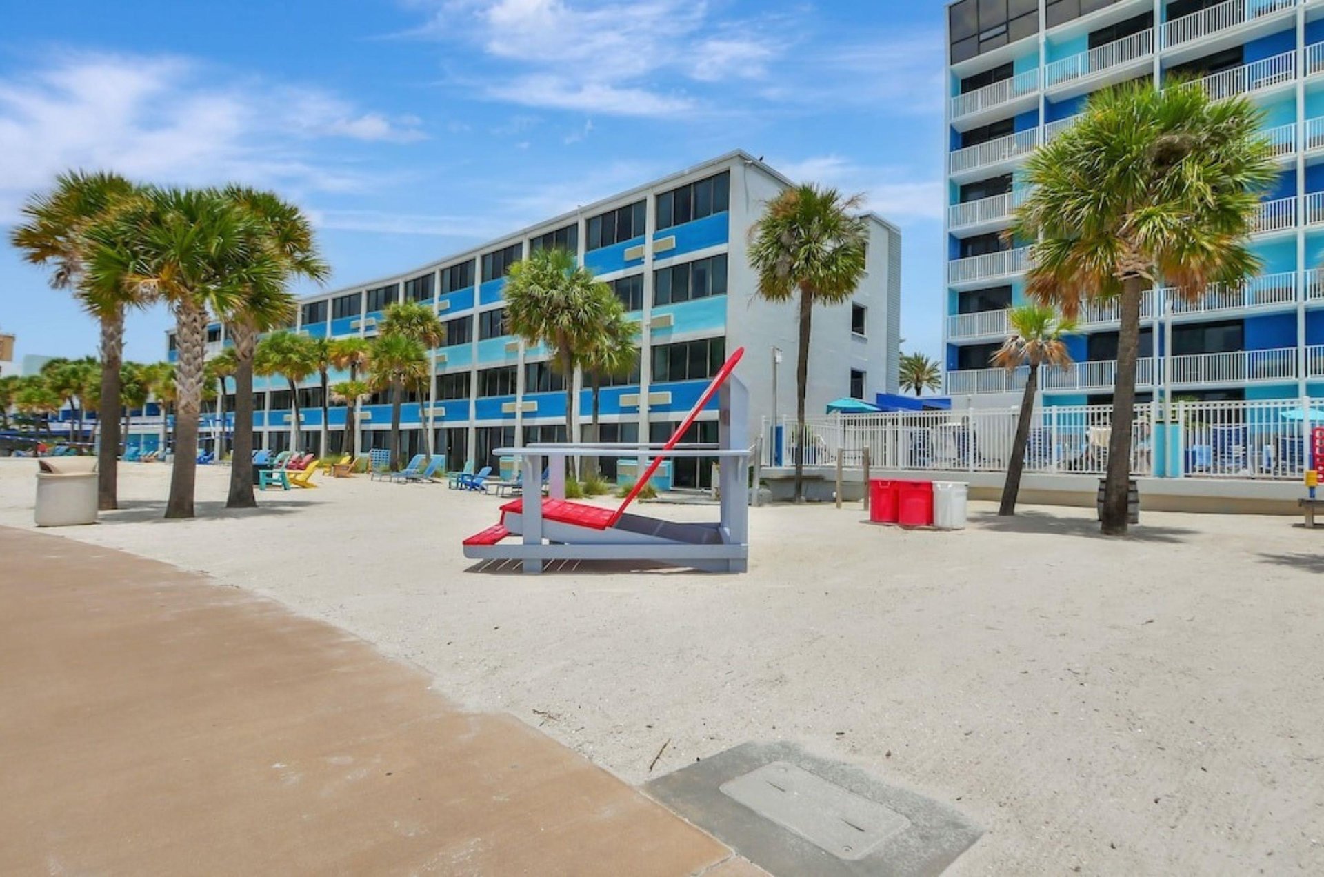 Colorful beach chairs in front of Bilmar Beach Resort
