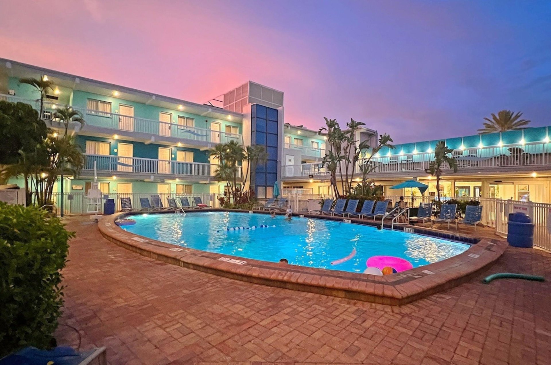 Enjoy a spectacular beach sunset by the lovely outdoor pools