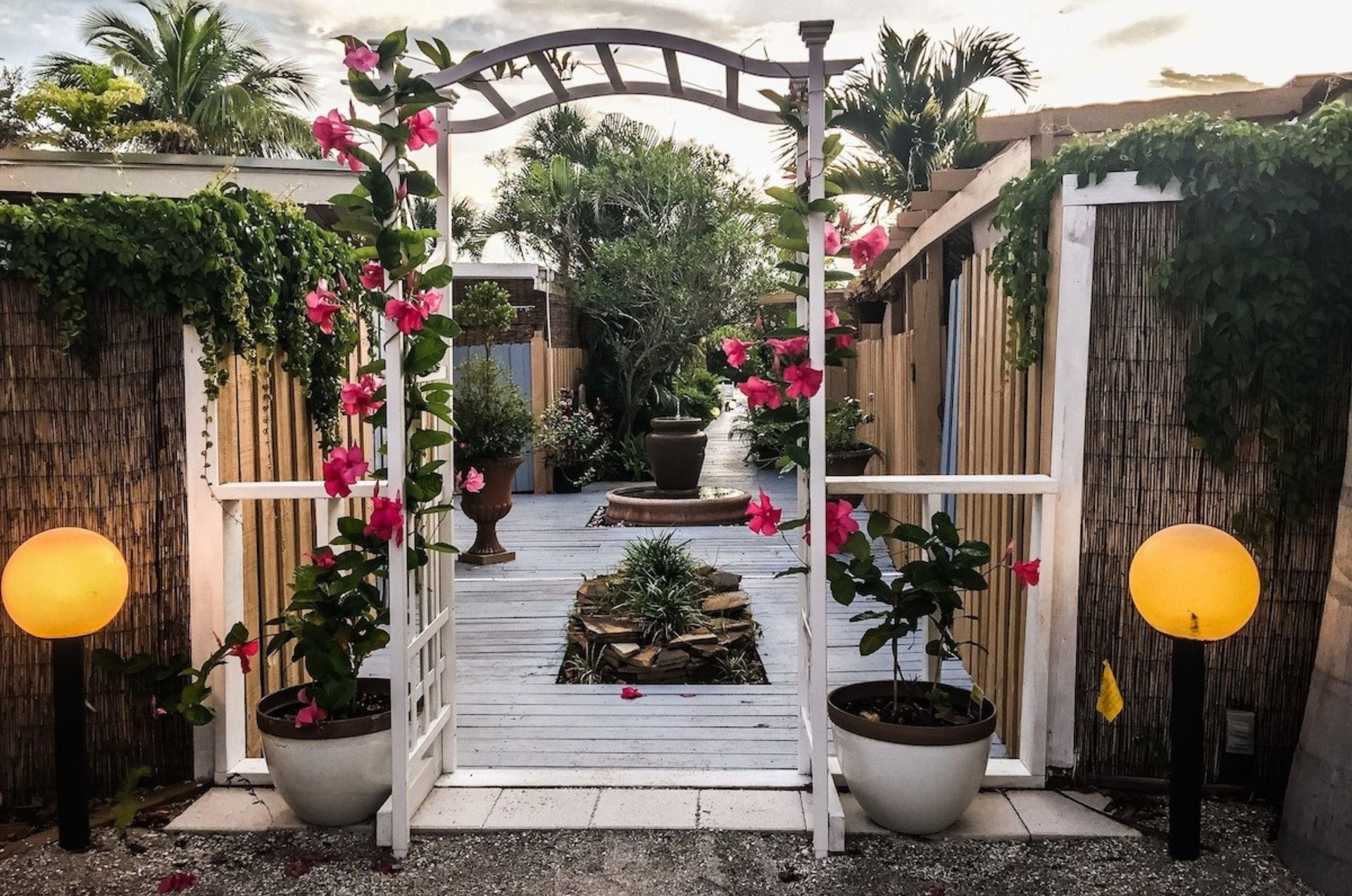 The floral courtyard at the Inn at Turtle Beach in Siesta Key Florida