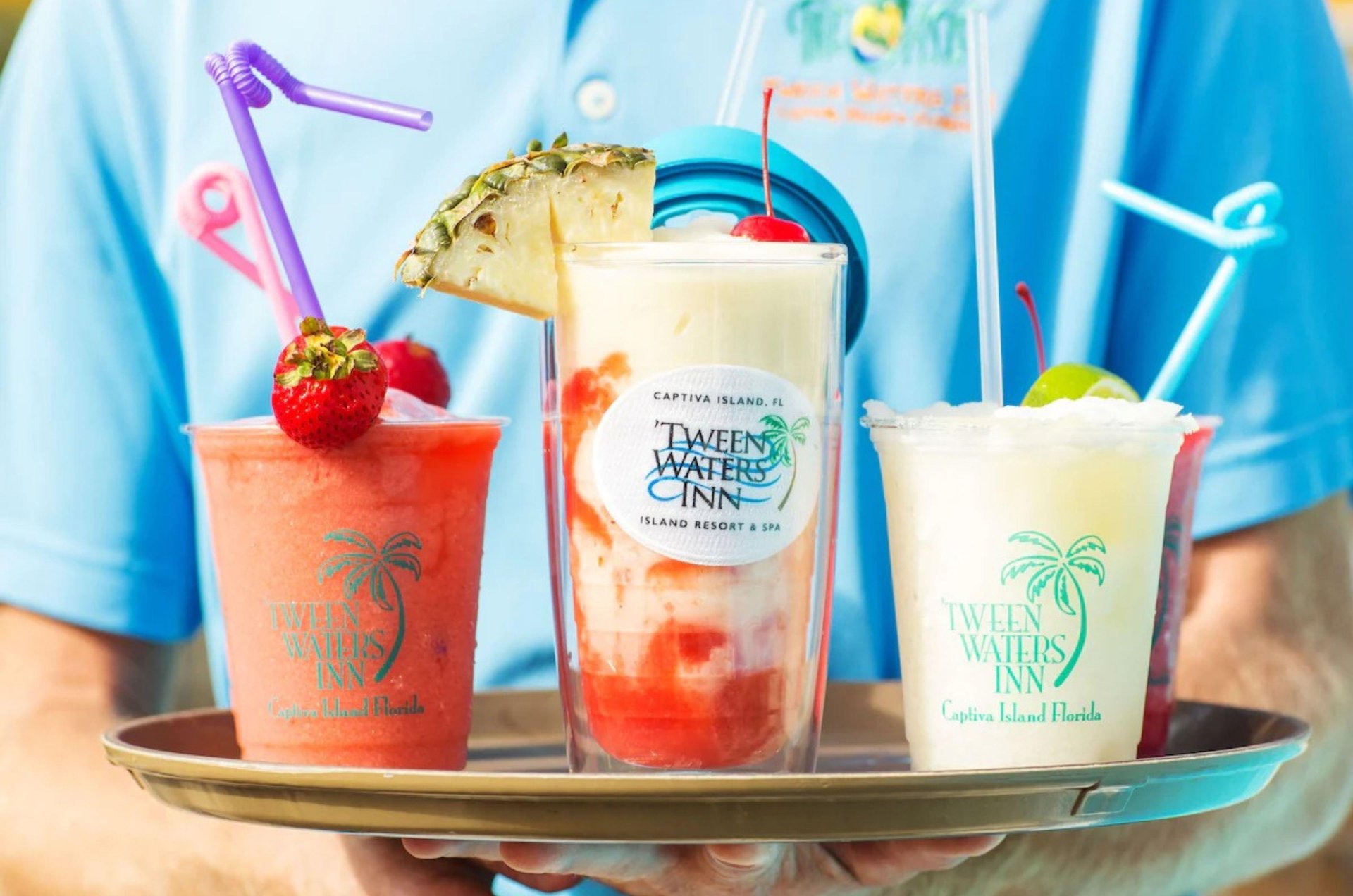 Relax by the poolside bar, just steps away from the Gulf