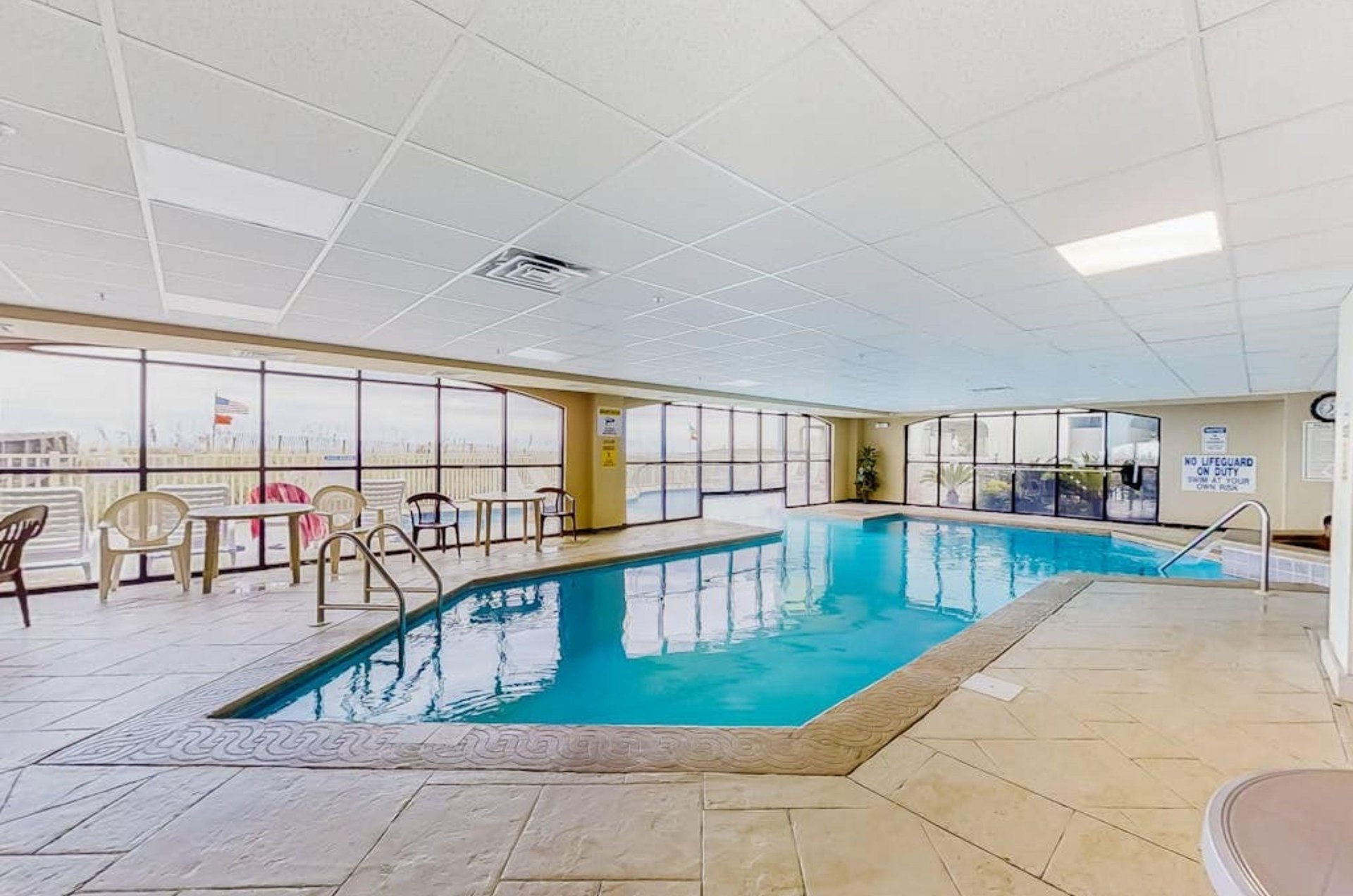 The indoor swimming pool overlooking the beach at Harbour Place in Orange Beach Alabama