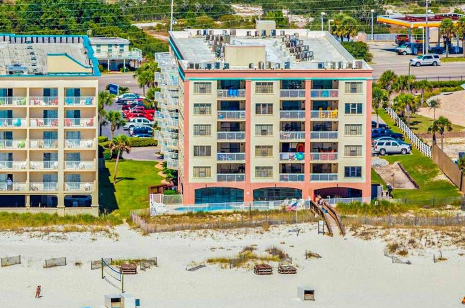 Aerial view of the beachfront facade of Harbour Place in Orange Beach Alabama