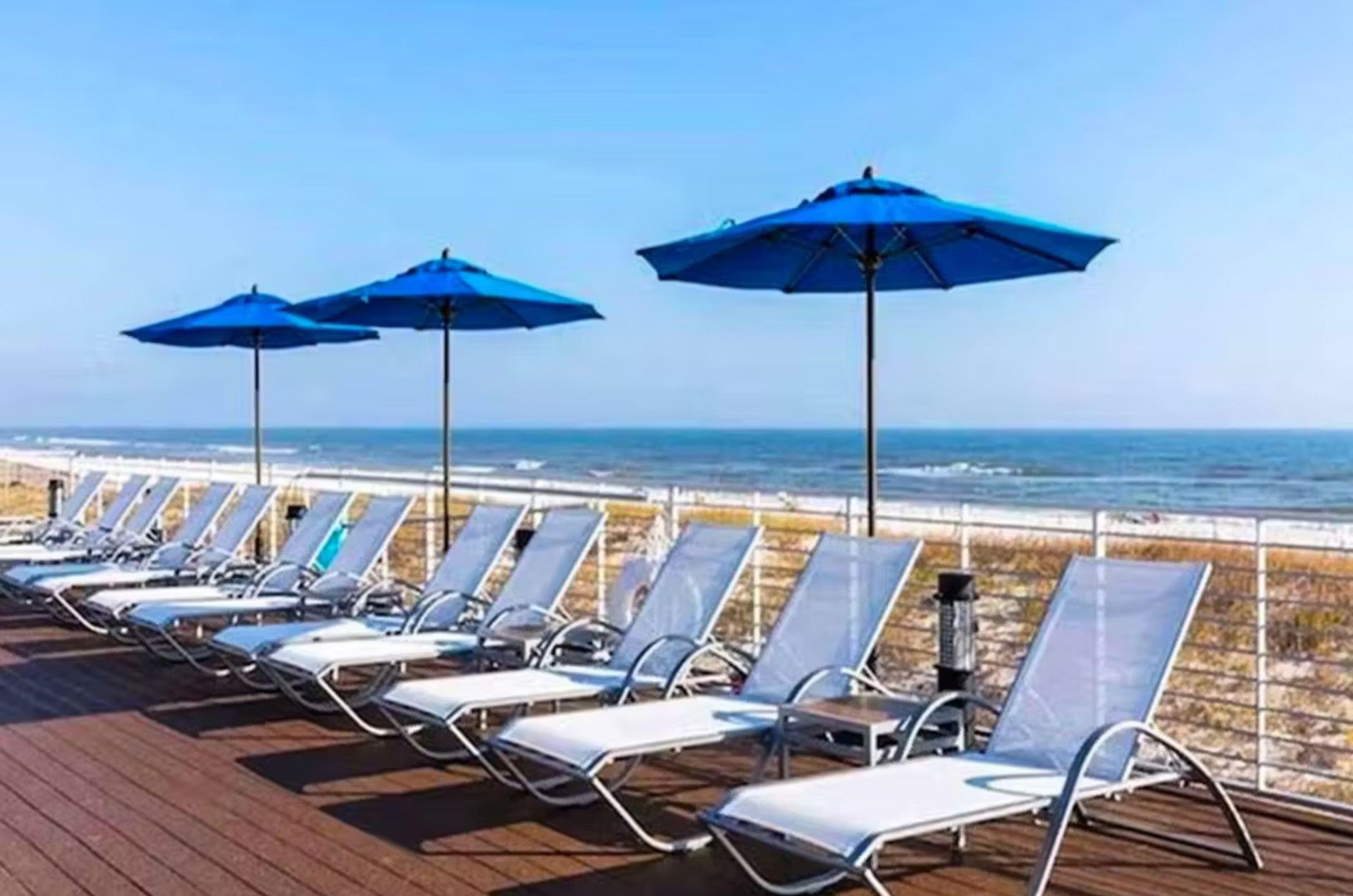 Lounge chairs on the Beach Club deck overlooking the Gulf of Mexico