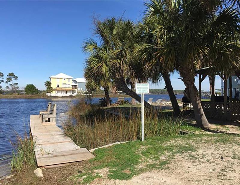 Take a moment to relax on the pier at The Cove in Gulf Shores Alabama