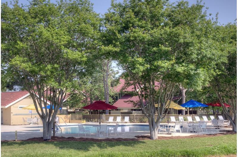 Shady pool area at Lovely lake area at Beachwalk Villas  Sandestin in Destin FL