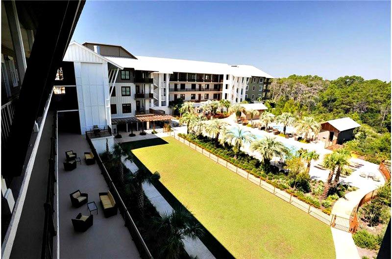 View of pool from balcony at Redfish Village in Blue Mountain Beach FL