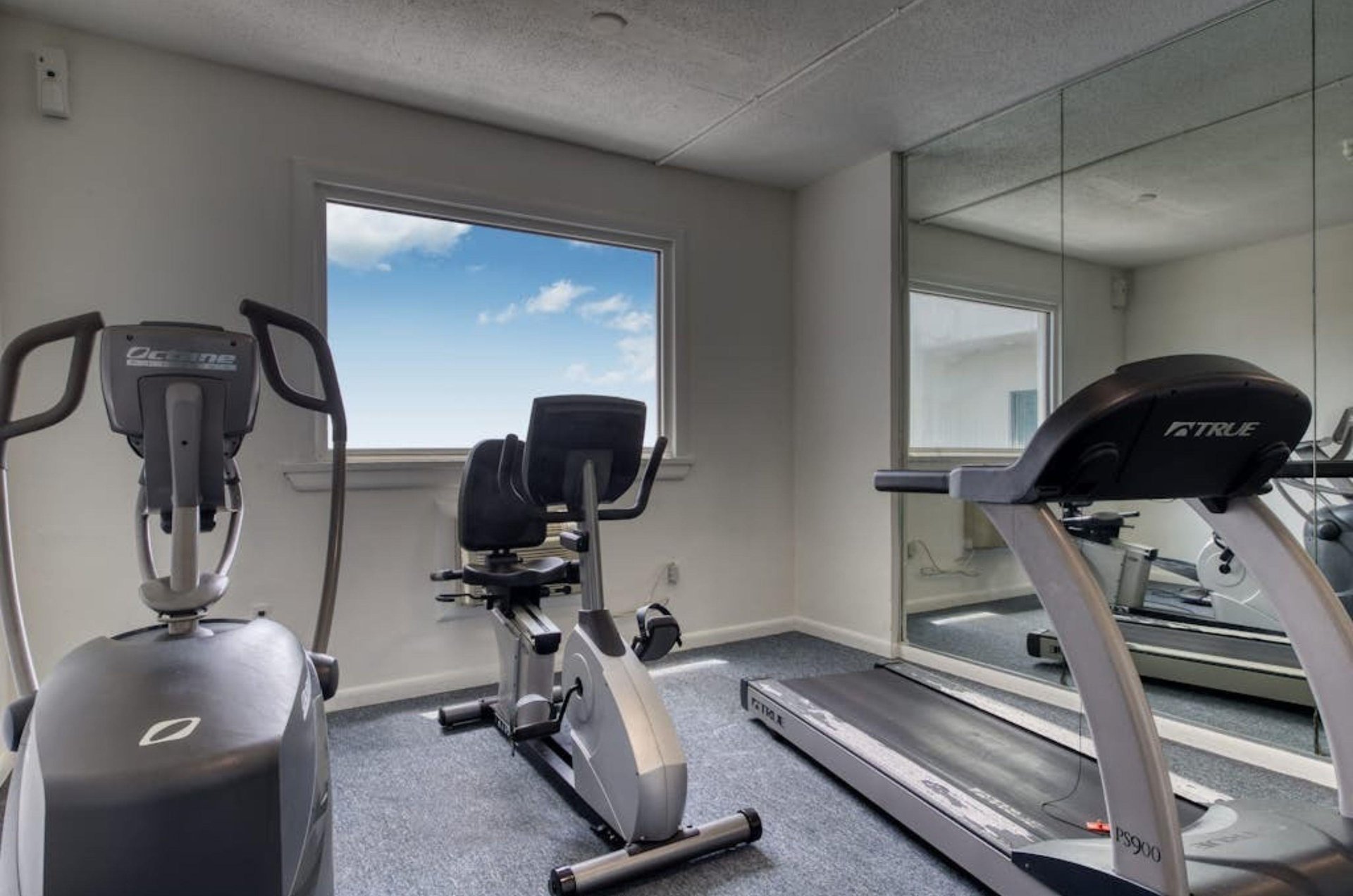 Cardio equipment in the fitness center at Palm Beach Condos in Orange Beach Alabama