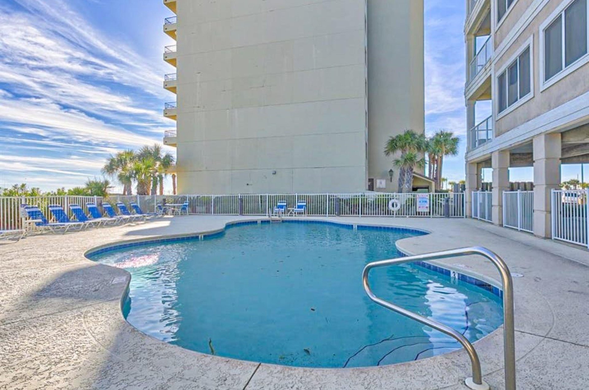 The outdoor swimming pool in front of Marlin Key in Orange Beach Alabama
