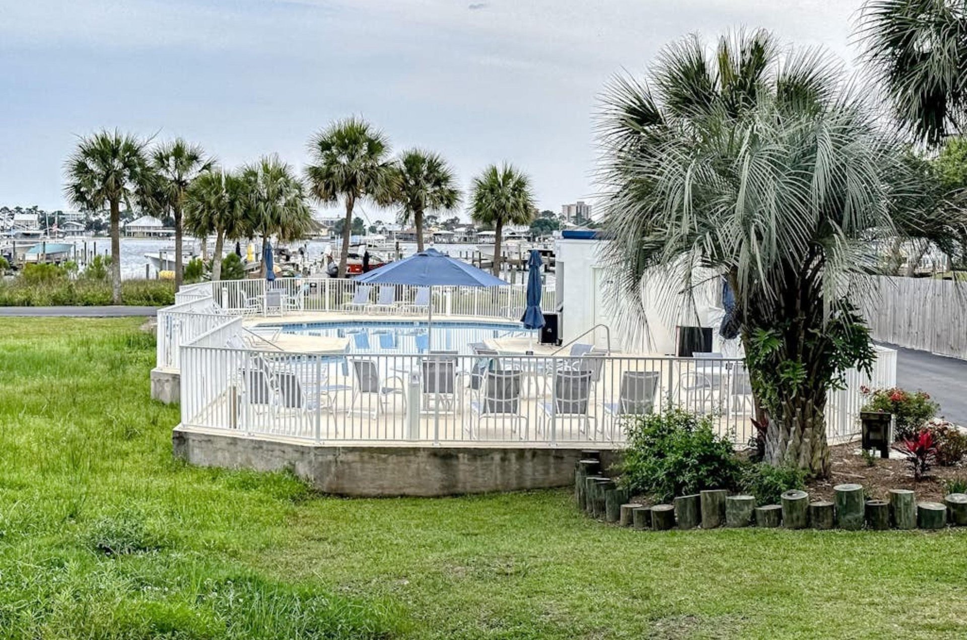The pool deck offers views of the cove and the marina
