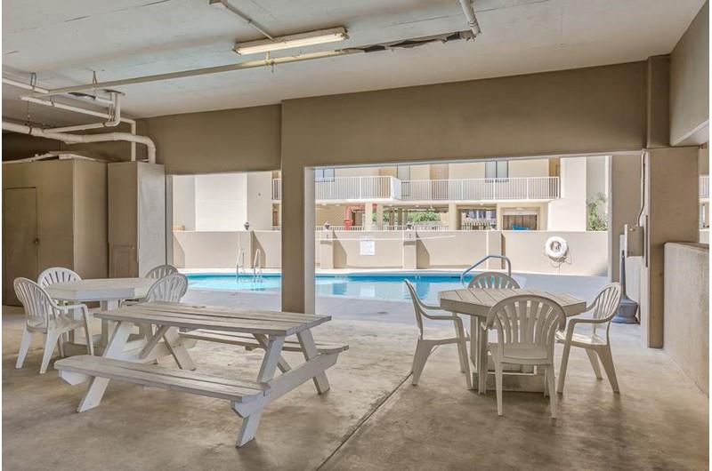 Picnic area overlooking the pool at Gulf House in Gulf Shores AL