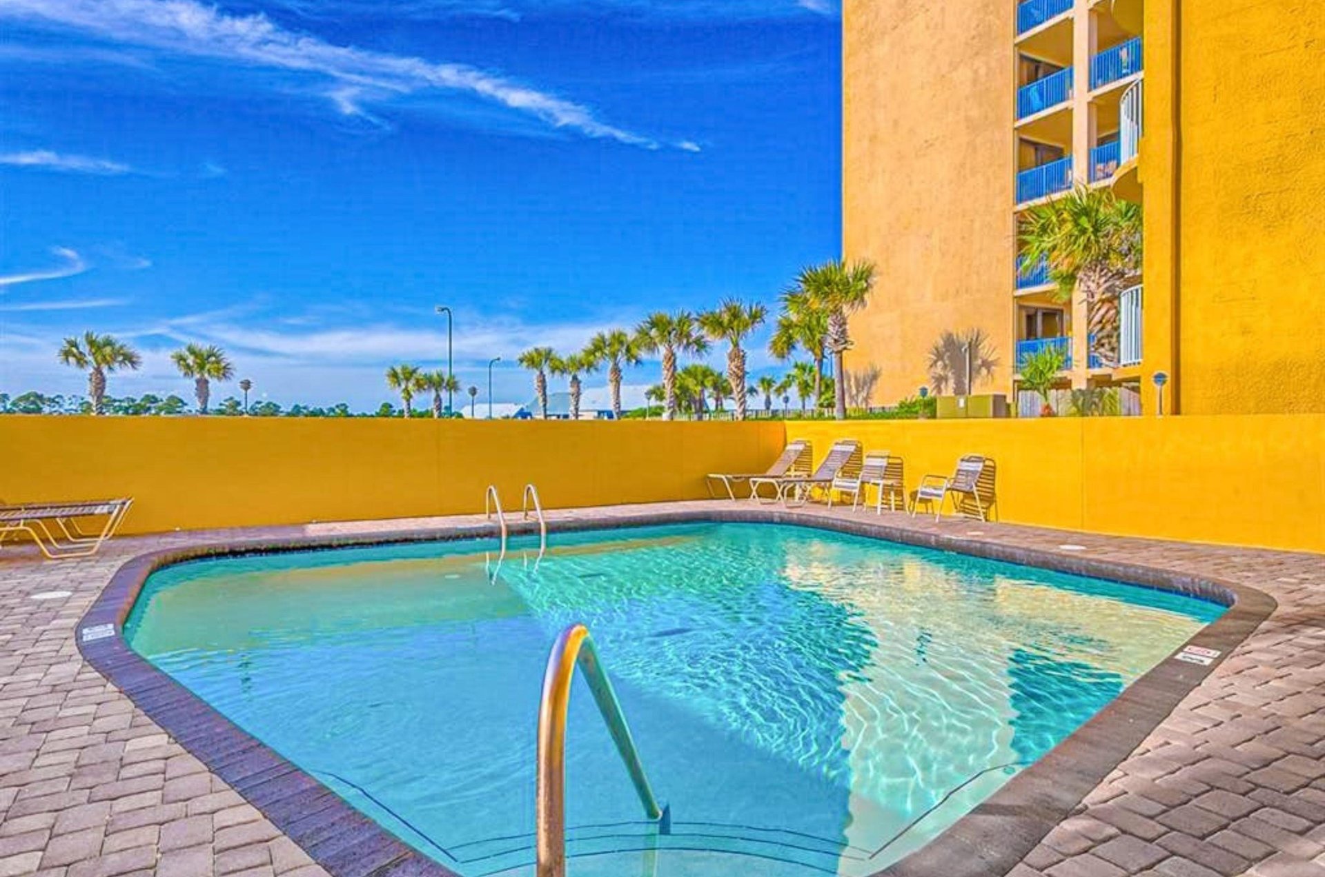 The outdoor swimming pool at Emerald Skye in Orange Beach Alabama