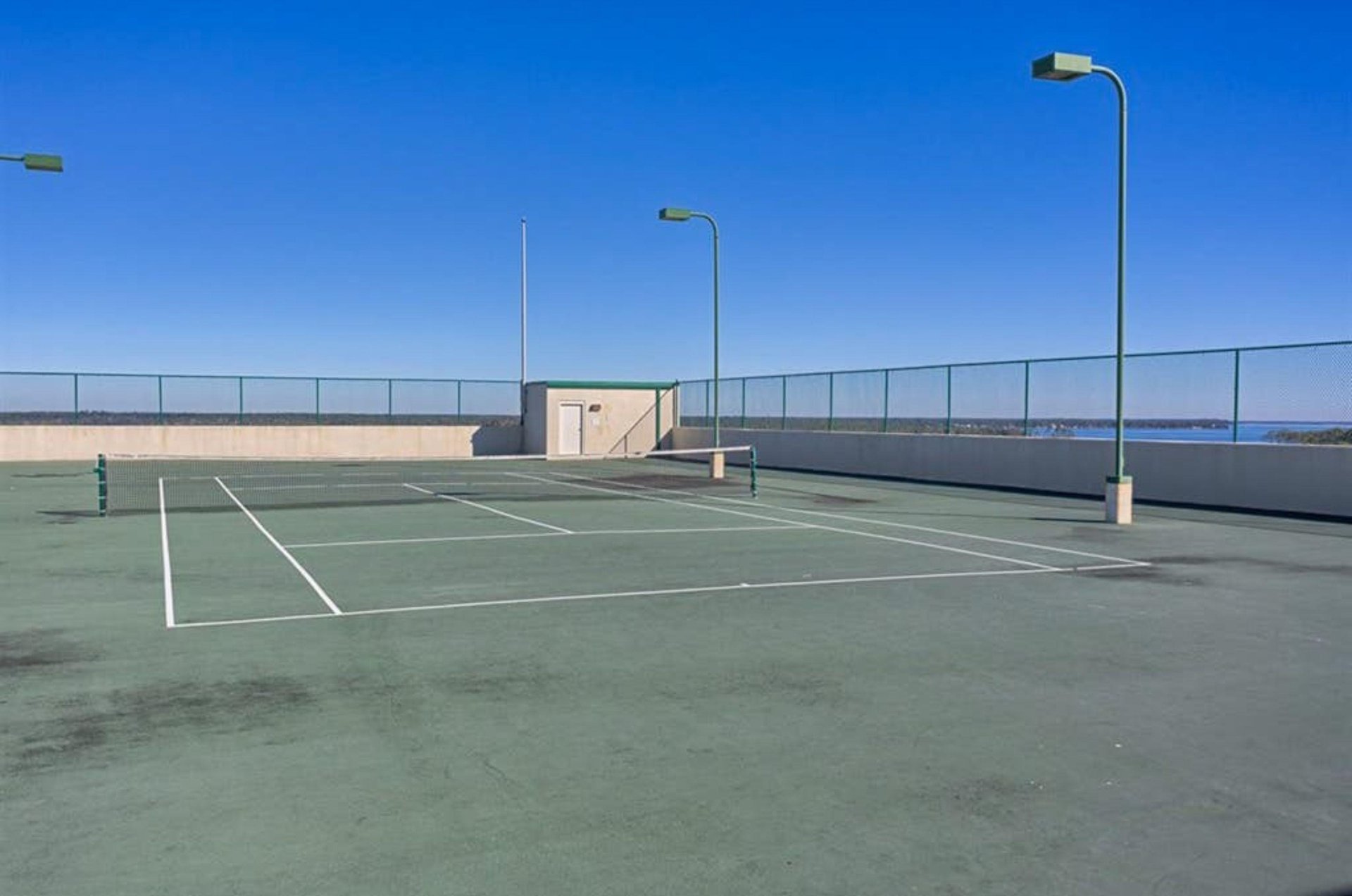 The outdoor tennis courts at Phoenix on the Bay