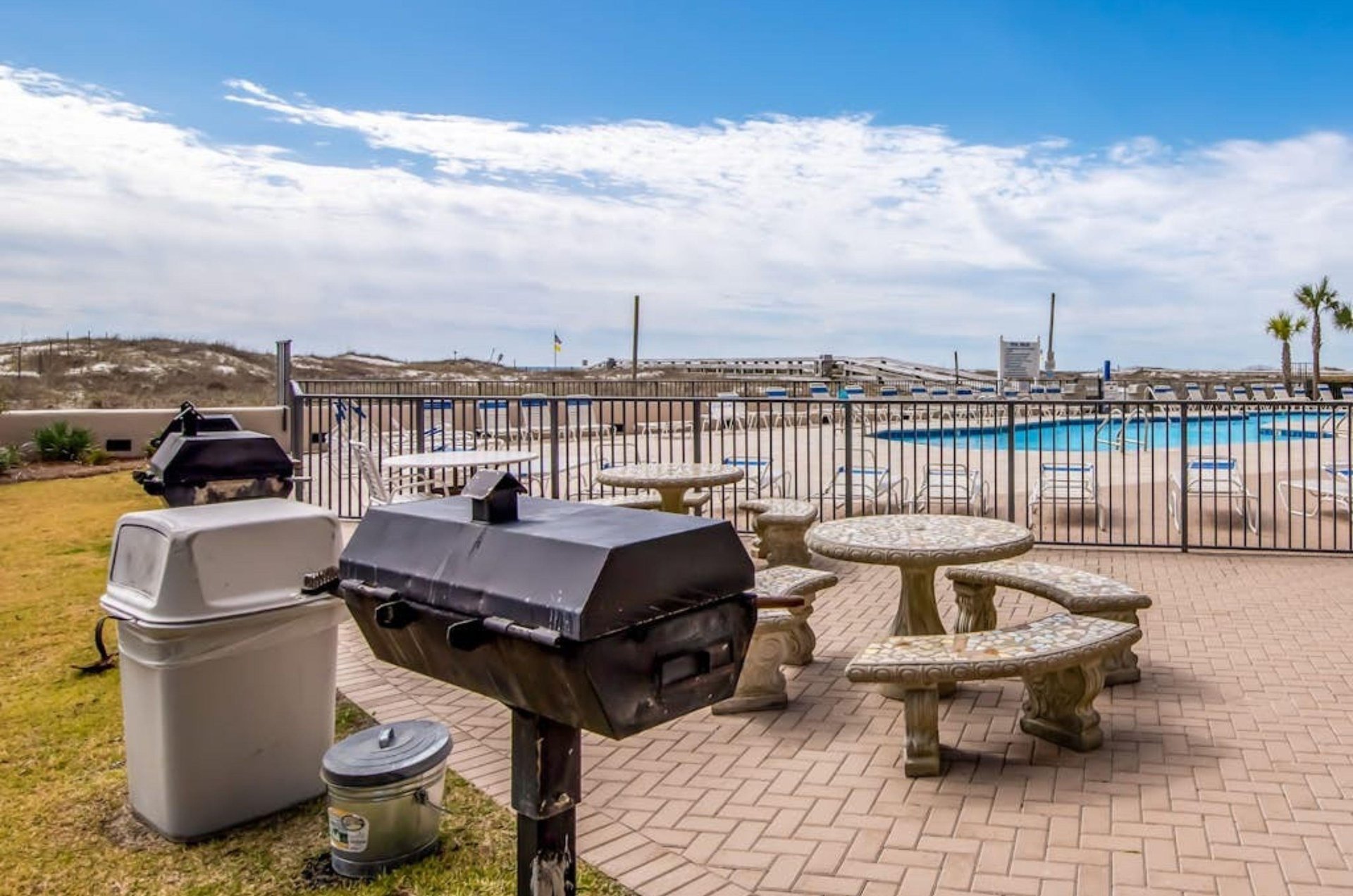 The community grills and picnic tables at Phoenix on the Bay in Orange Beach Alabama