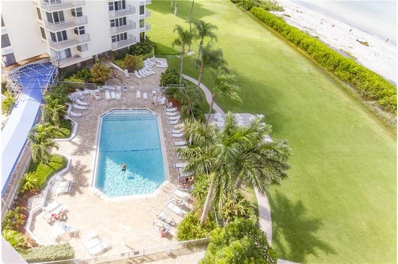 View the pool from balcony at Estero Beach and Tennis Club in Fort Myers Beach FL