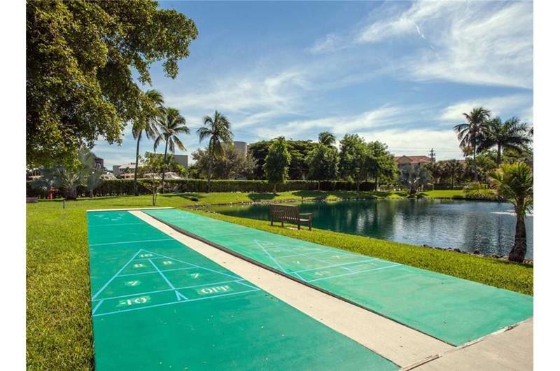 Play shuffleboard while staying at Estero Beach and Tennis Club in Fort Myers Beach FL
