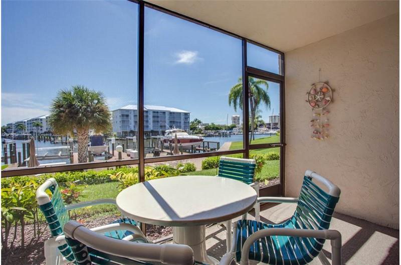 Enjoy view of boats and canal from Estero Yacht  Racquet in Fort Myers Beach Florida