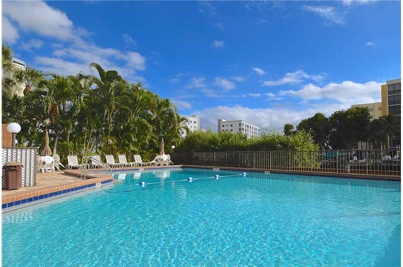Enjoy the large heated pool at Estero Yacht  Racquet in Fort Myers Beach Florida
