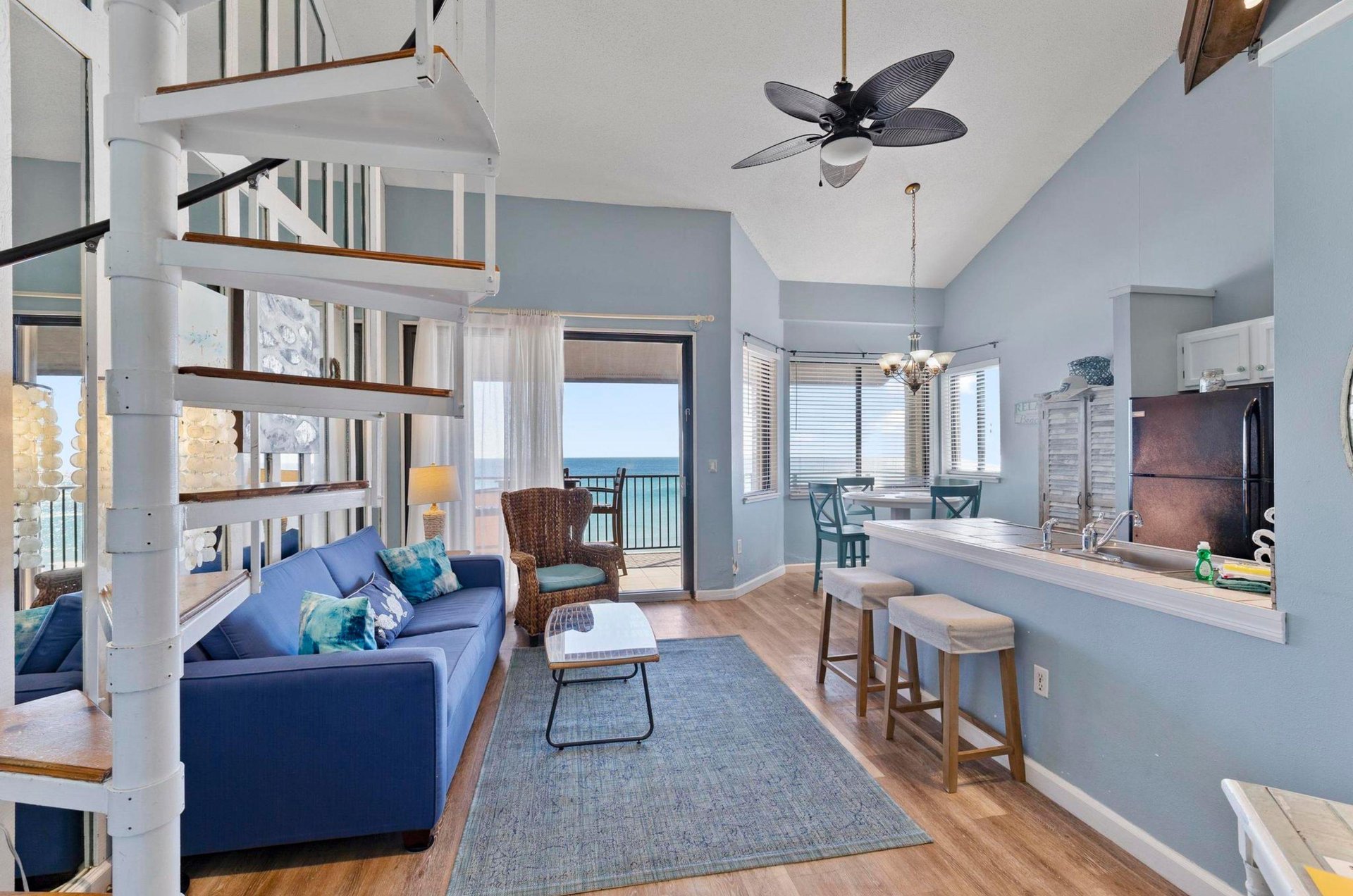 The living area of a cozy beachfacing unit